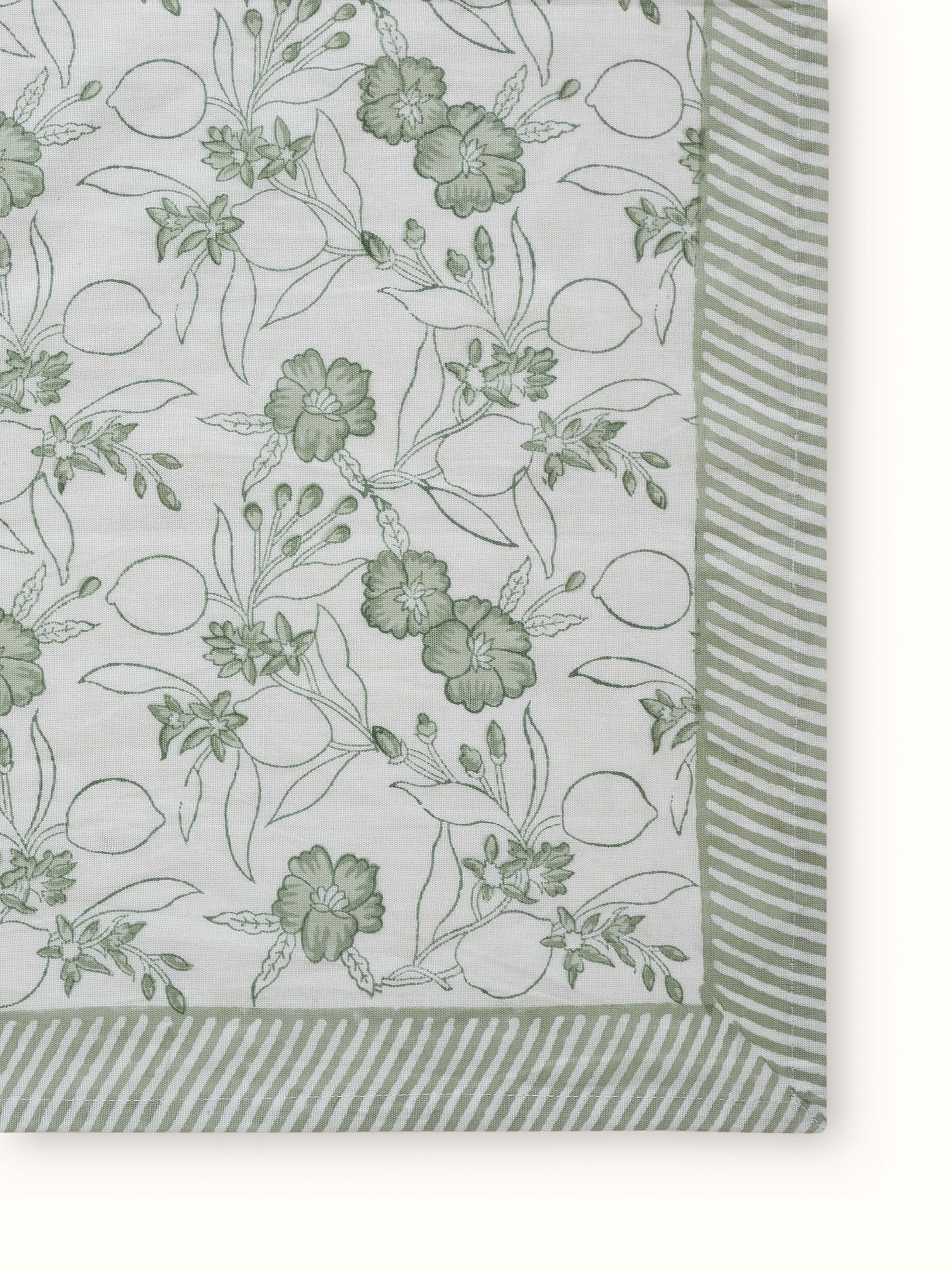 Side view showing the table cover draping elegantly on a 6 seater table