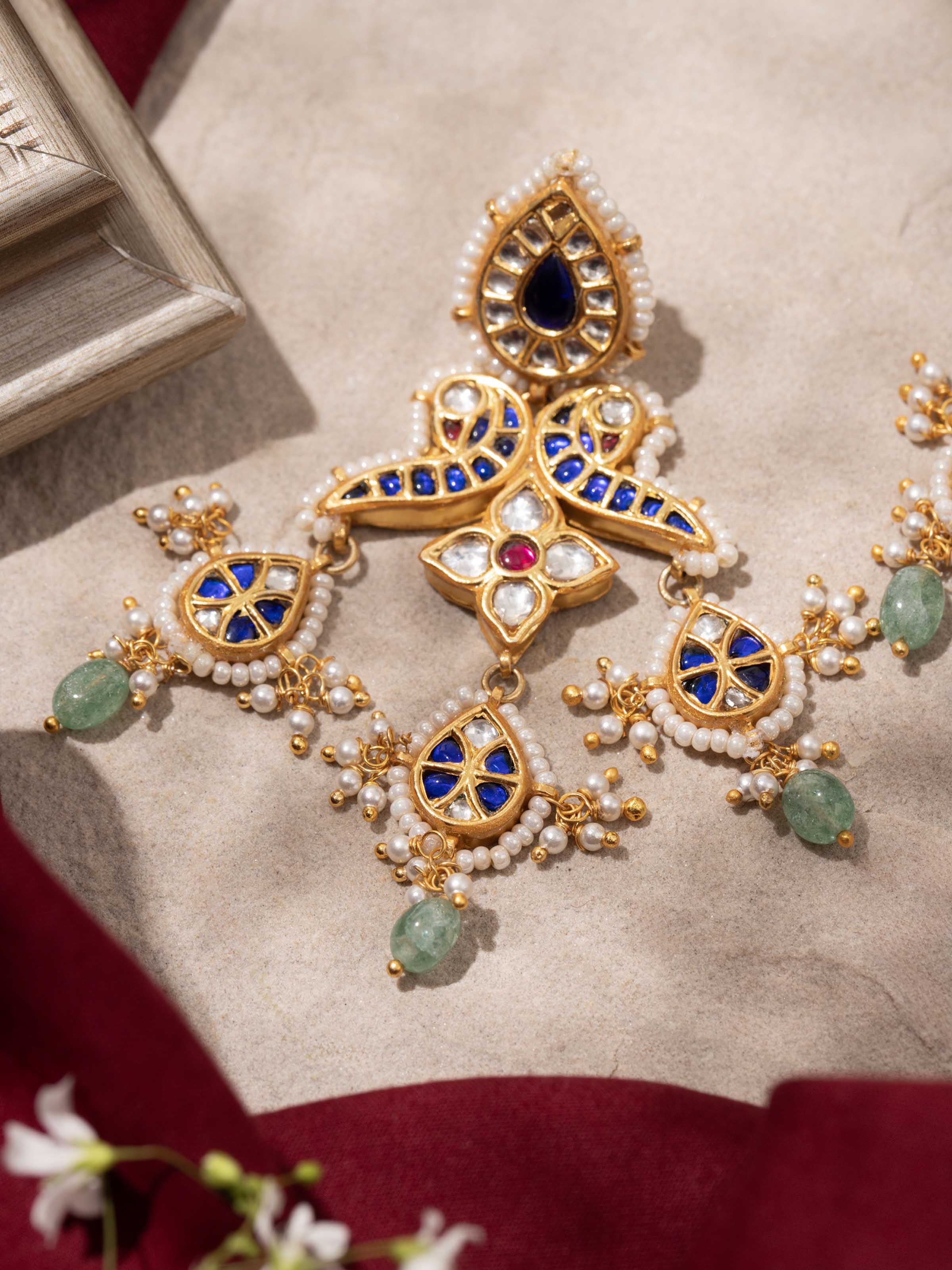 Close-up detail of hammered silver texture on drops earrings