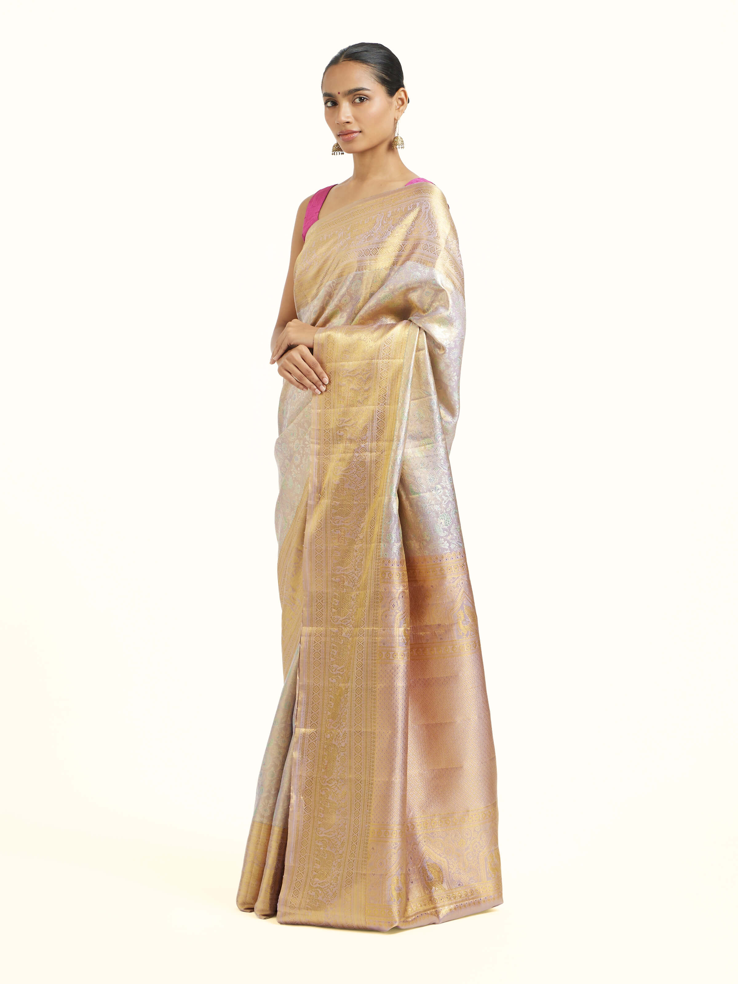 Side view of silver silk Kancheepuram saree showcasing elegant drape