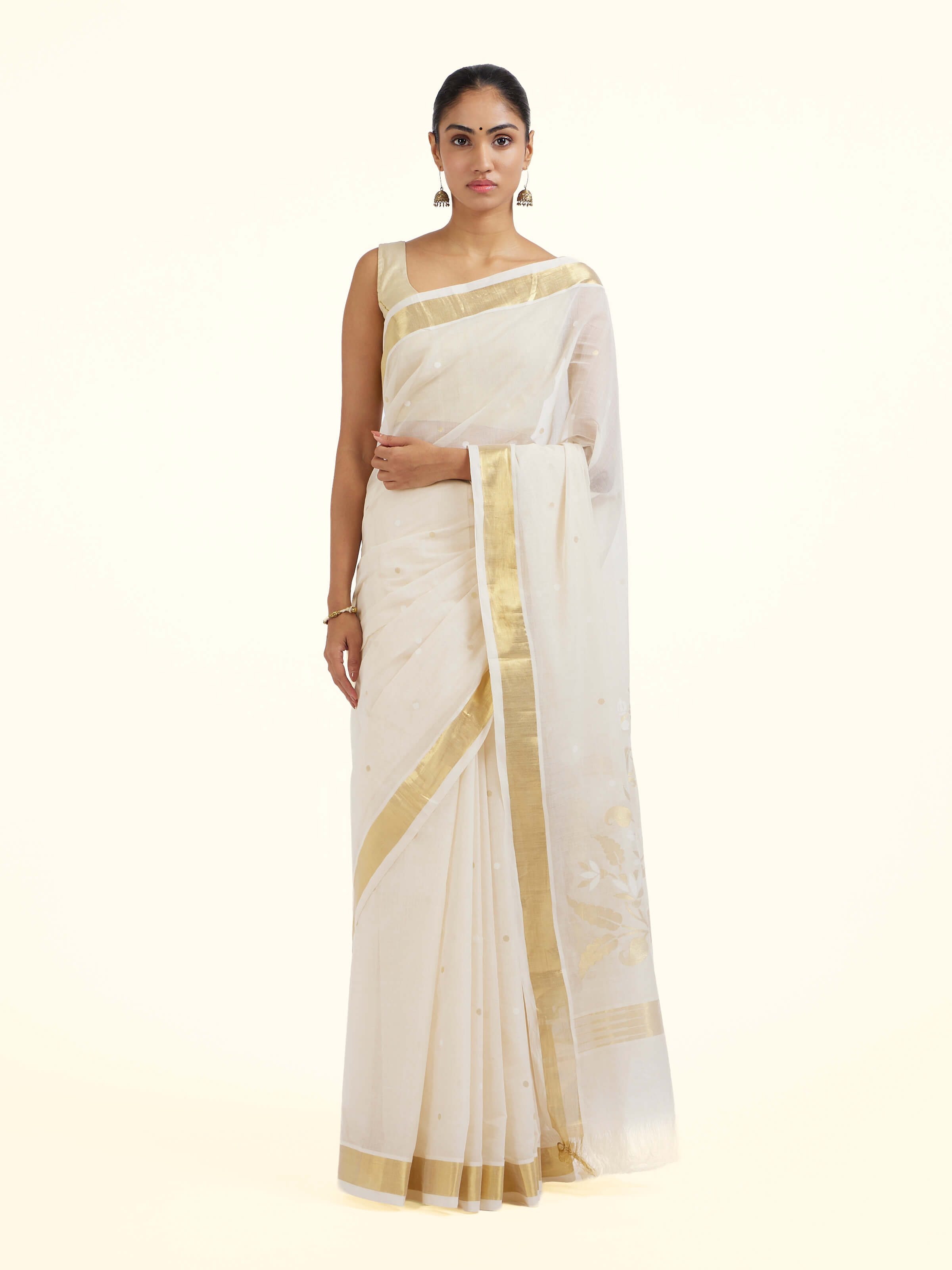 Front view of off-white cotton silk Venkatagiri Jamdani saree with delicate woven motifs