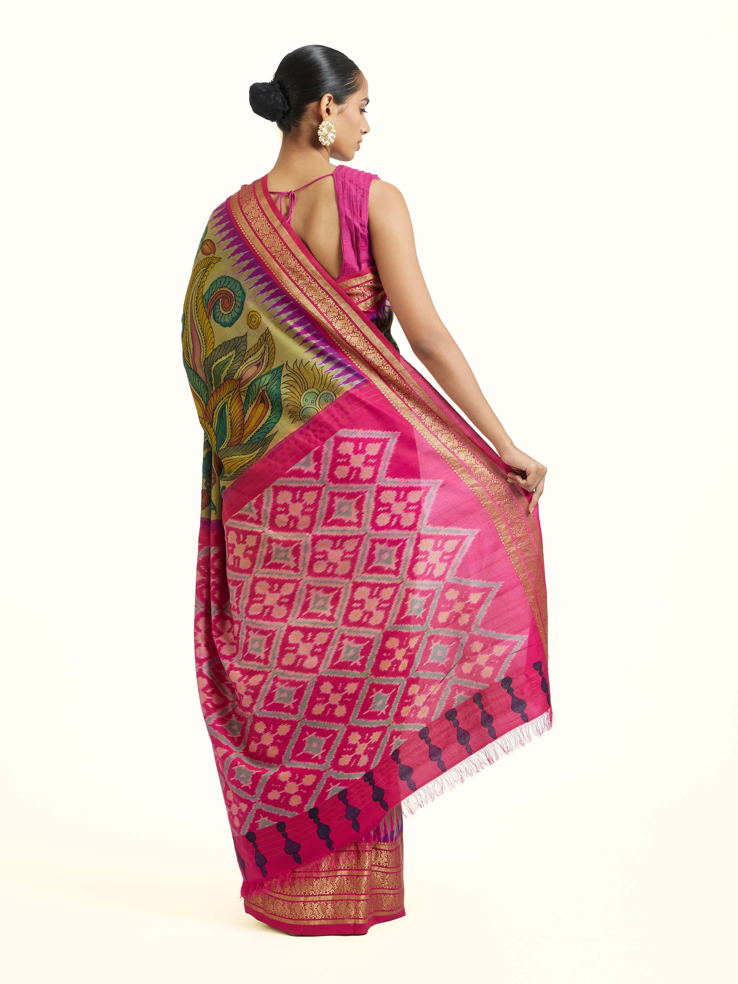 Back view of silk Ikat Kalamkari saree displaying full pallu and design