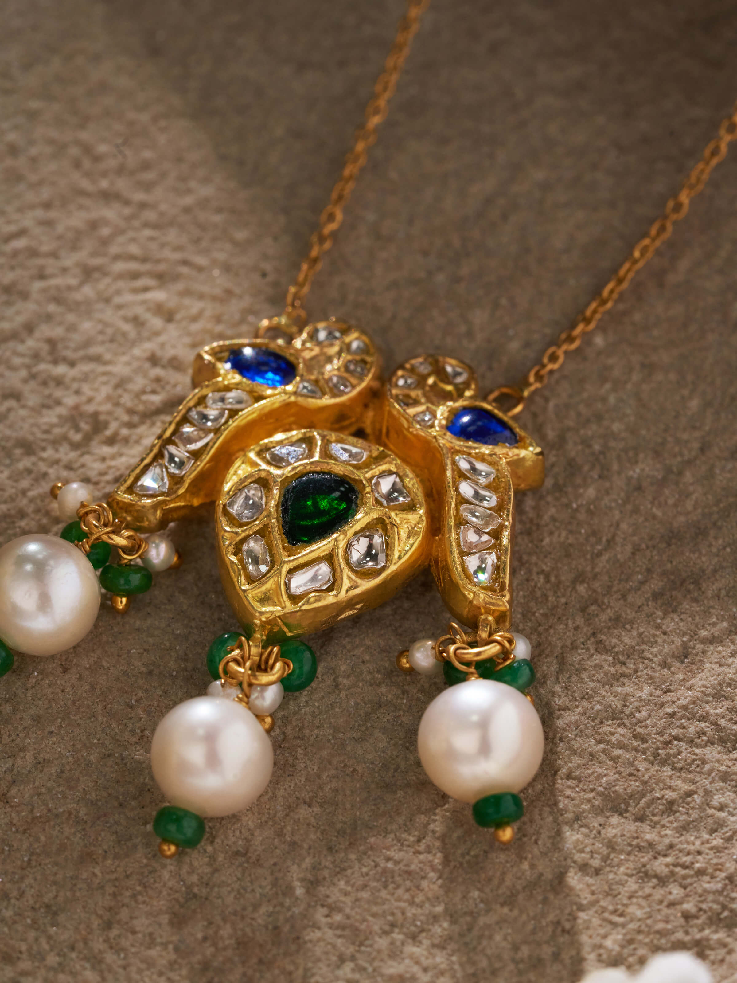 Detailed view of Swadesh Thappa Gold Pendant & Chain showcasing intricate motifs and premium gold craftsmanship