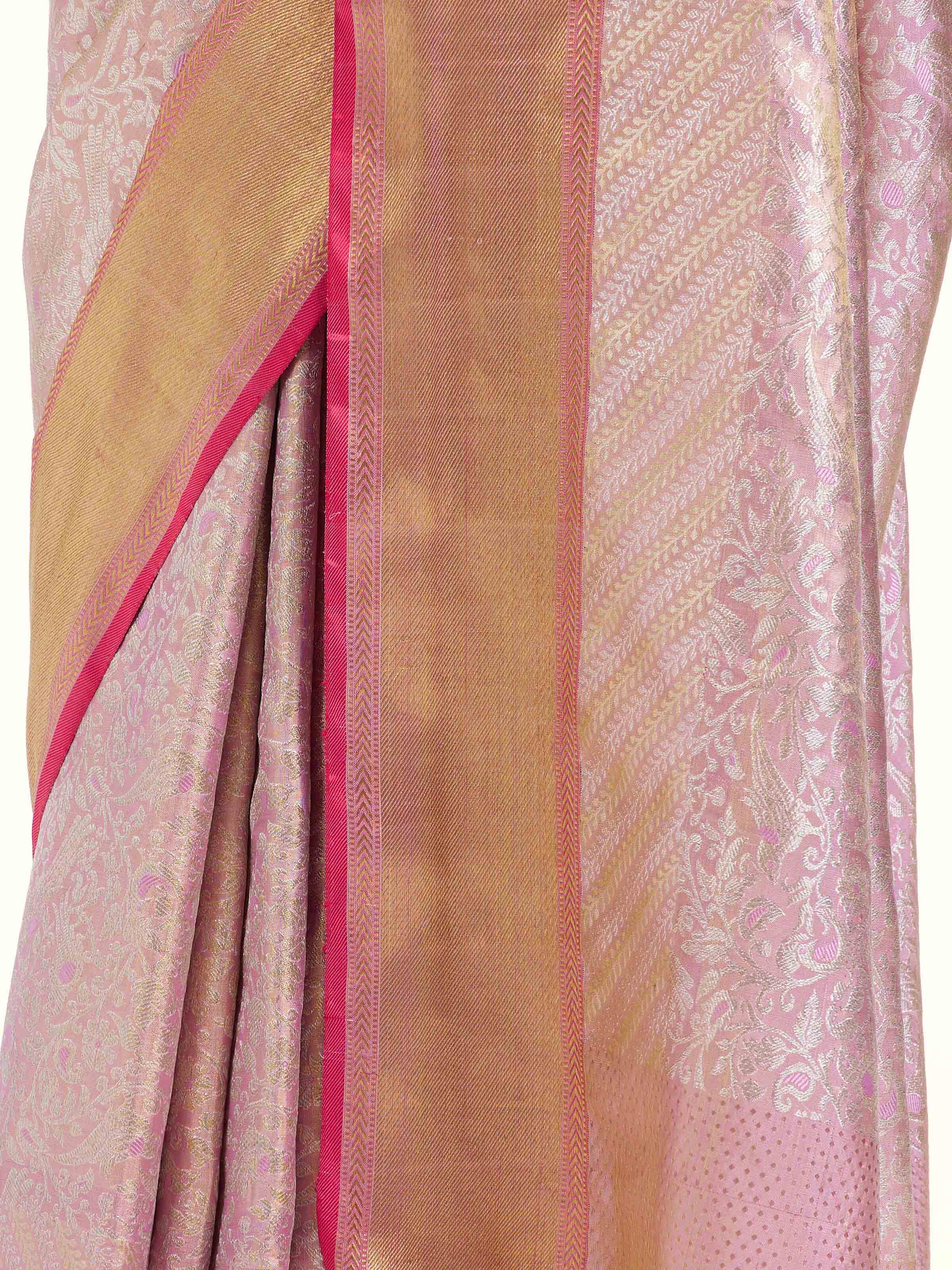 Detail view of mauve silk Kancheepuram saree showing zari work