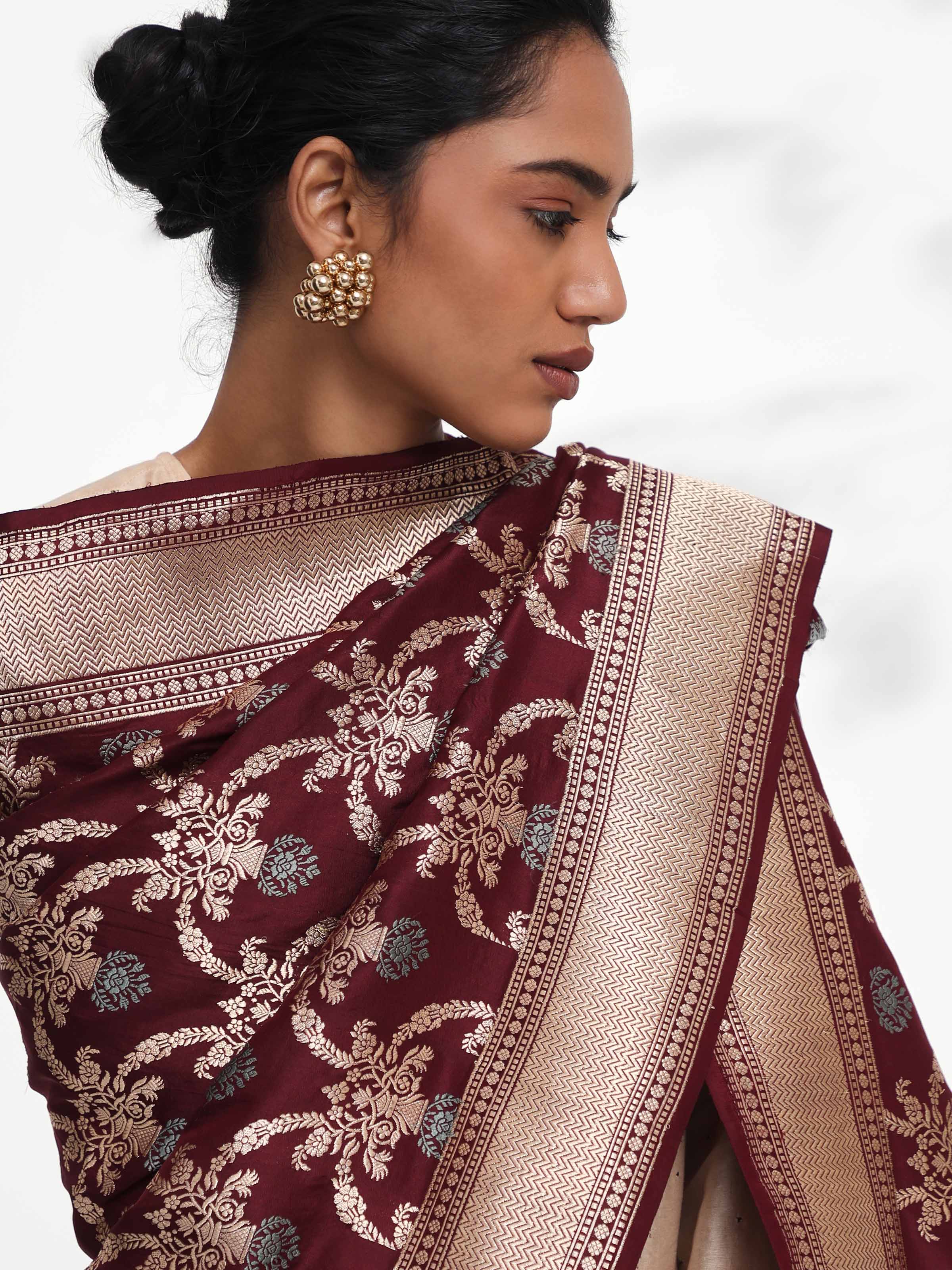 Detail view of wine Banarasi silk kadwa jangla handwoven dupatta showing intricate craftsmanship