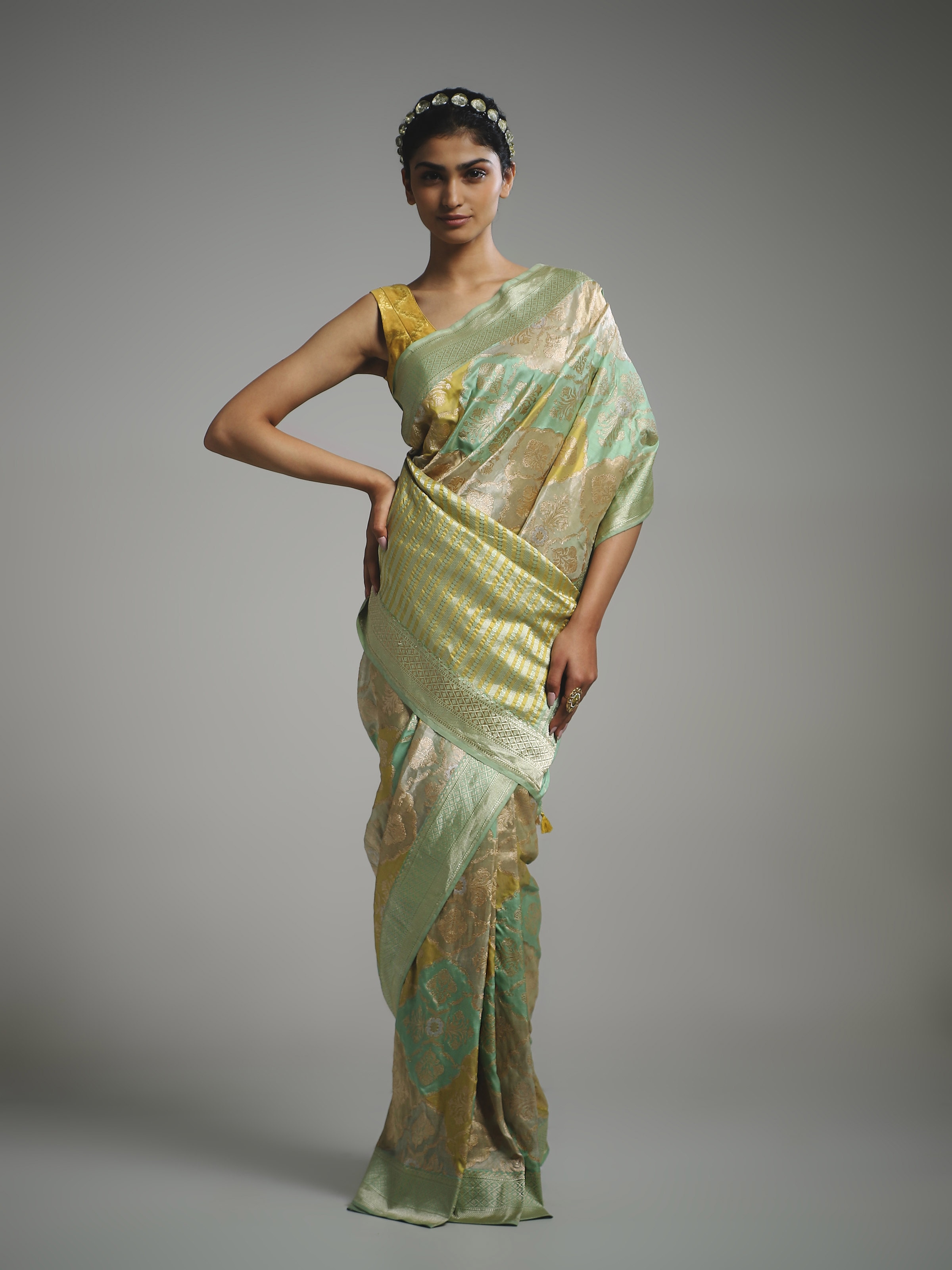 Side view of silk rangkat Banarasi saree highlighting fluid drape