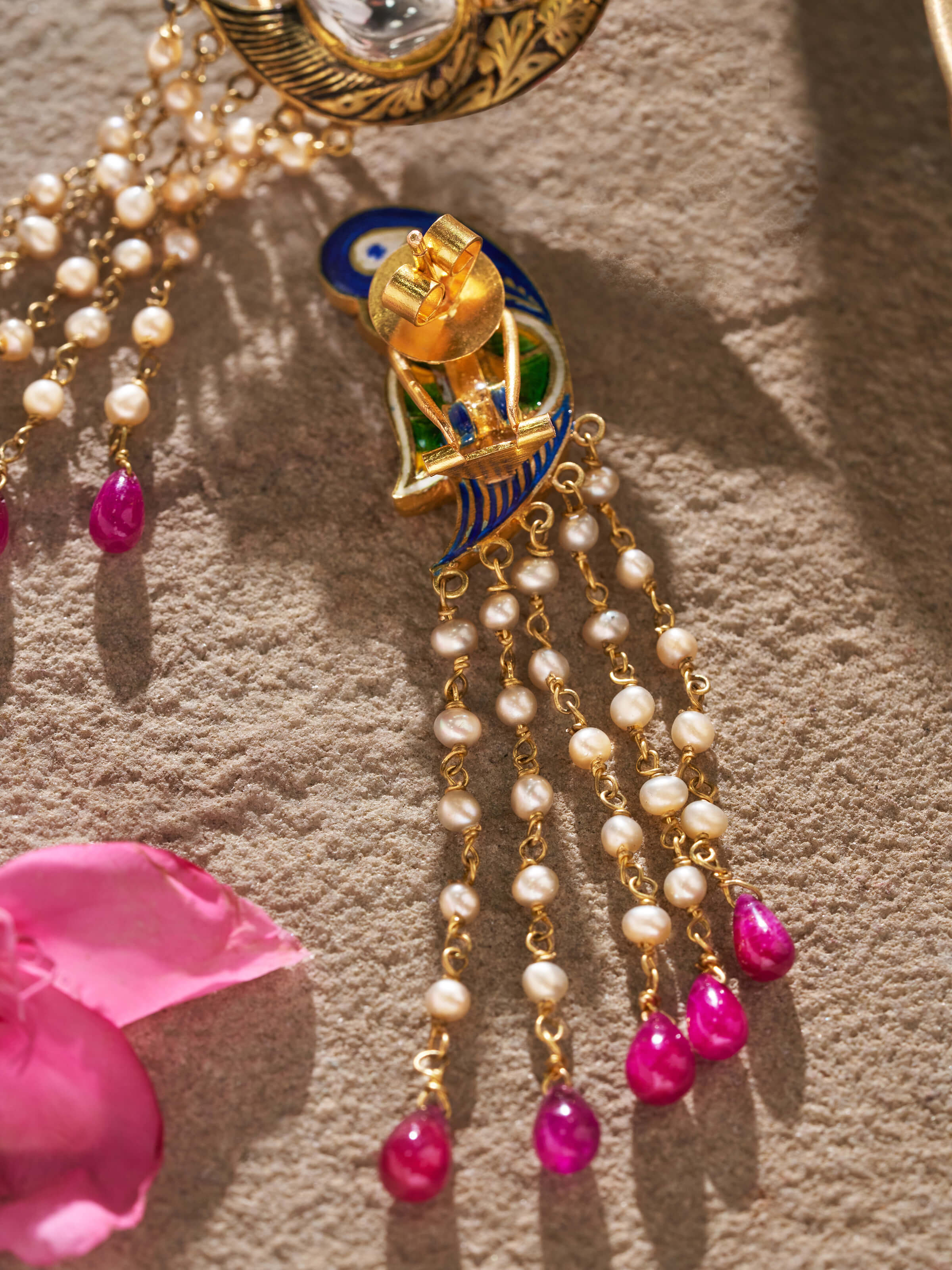 Angled view of Partash 18 Karat Gold Drop Earrings displaying their elegant drop design and fine finish.