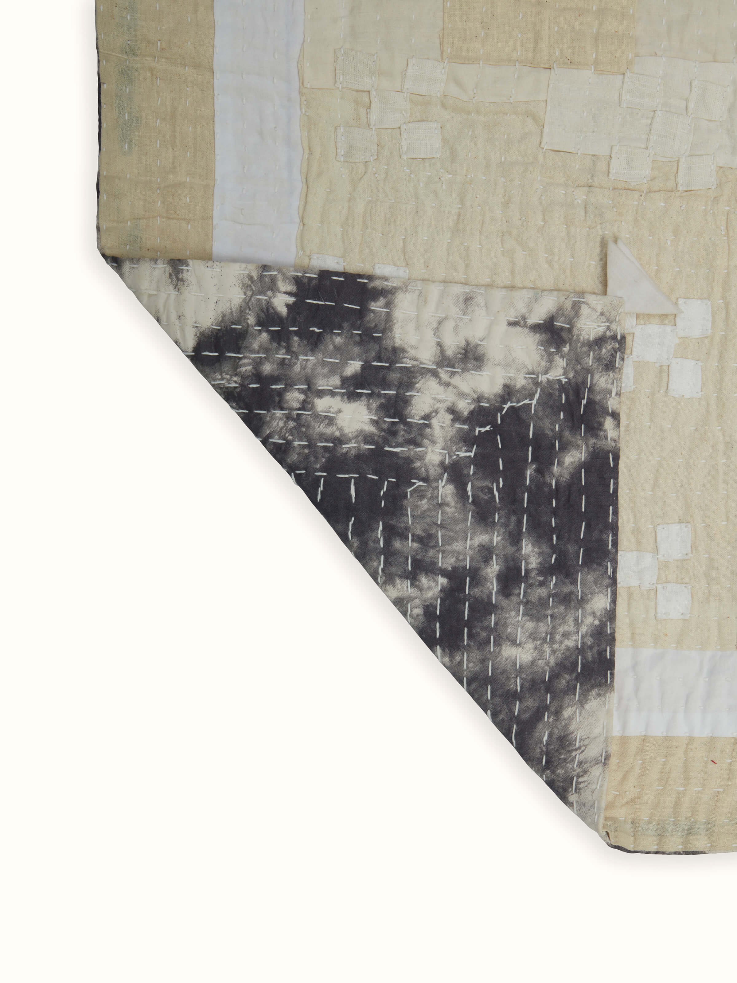 Another close-up view of Siddi abstract patchwork bedspread fabric