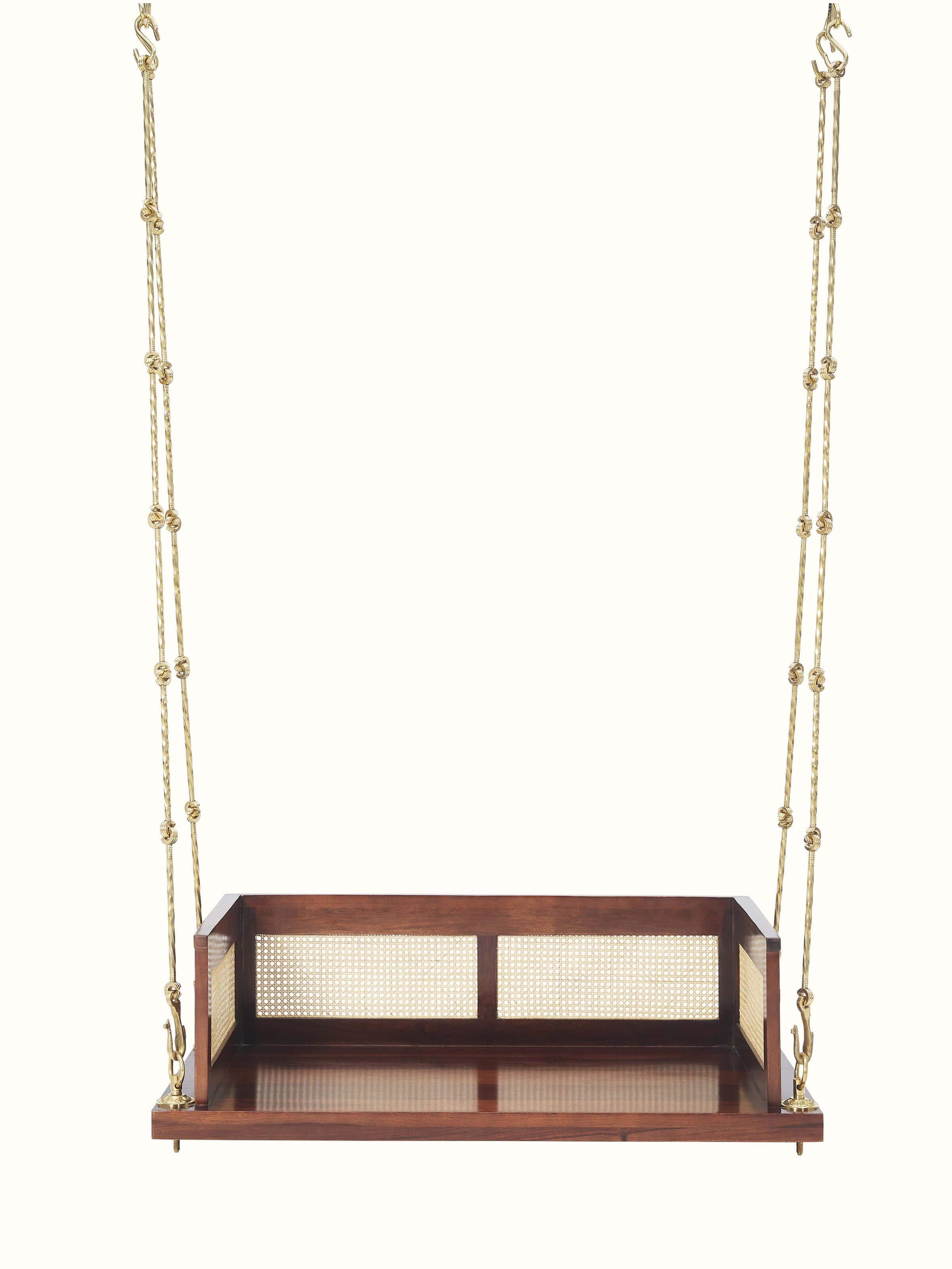 Front view of the Sheesham wood and cane swing, showcasing its elegant design and sturdy construction
