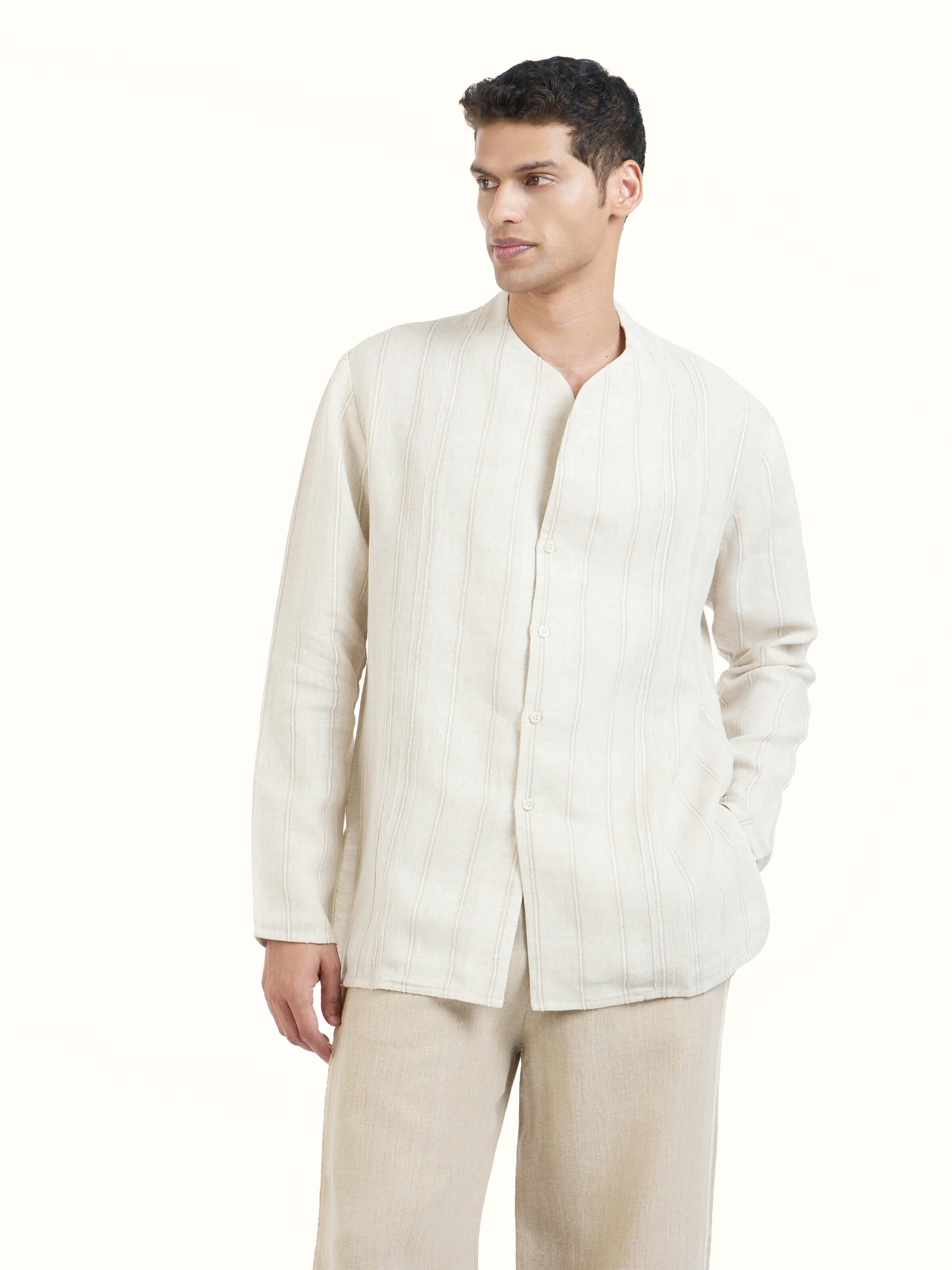 Angled view of ivory linen handloom full sleeve shirt showcasing handloom texture and natural finish