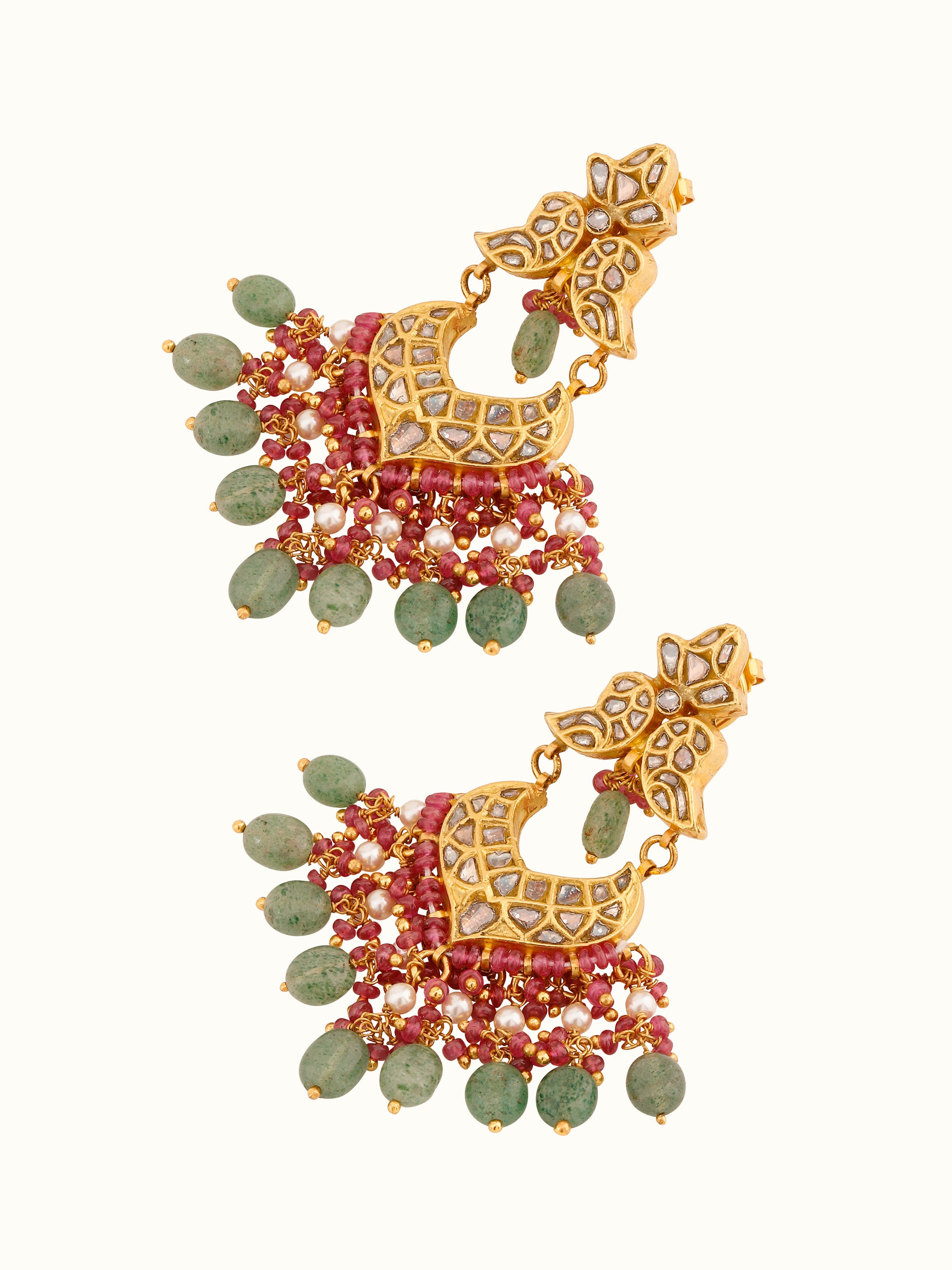 Overhead view displaying the elegant shape and finish of Thappa gold earrings