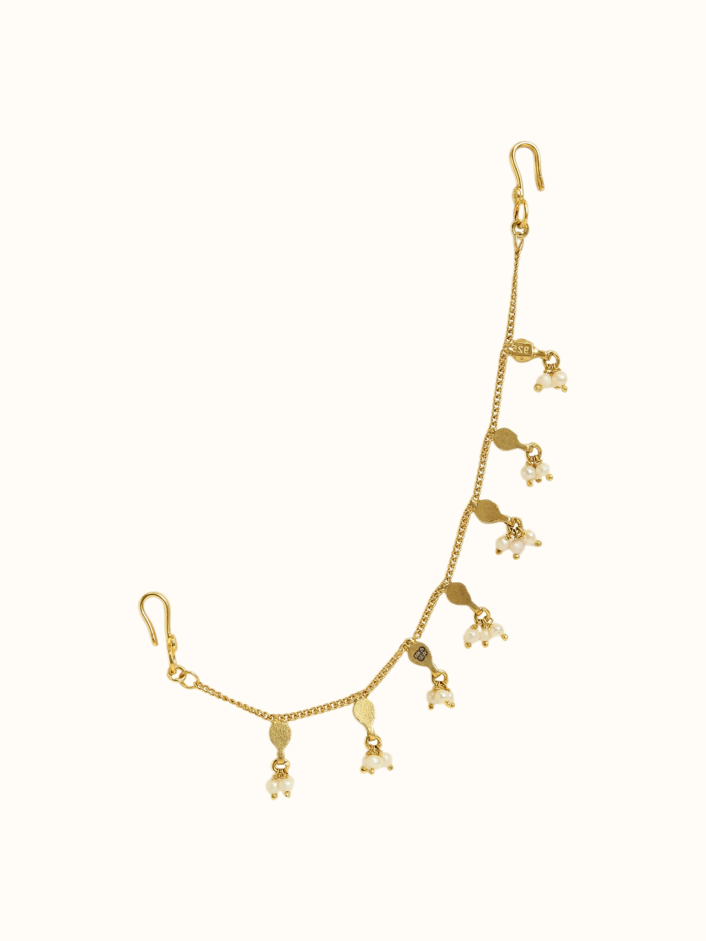 back view of silver smithing gold plated ear chain showing clasp