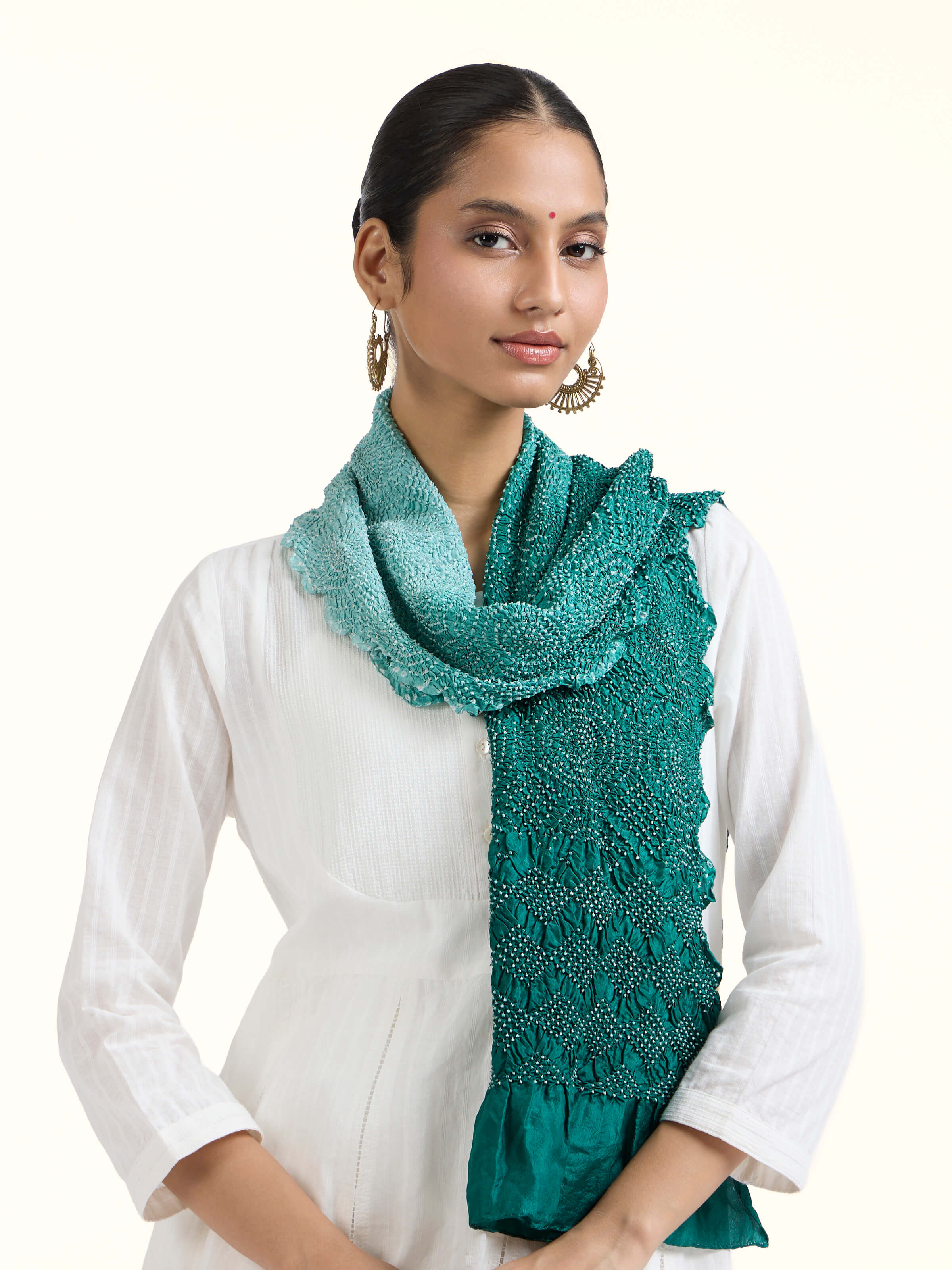 Angled view of Teal Bandhani Tie & Dye Silk Stole revealing the depth of its color and intricate pattern