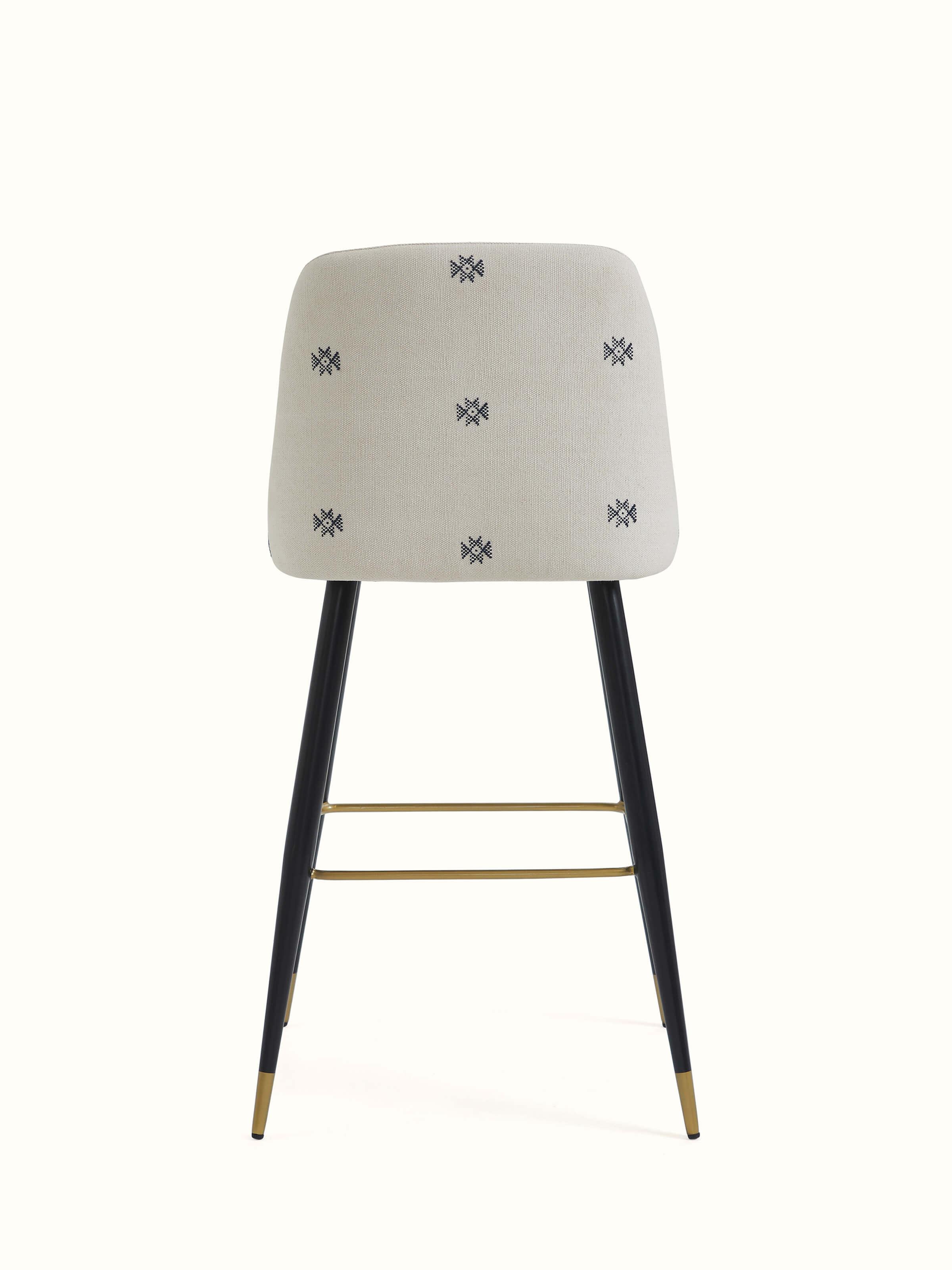 Back view of Upholstered Metal Bar Chair showcasing the clean lines of the metal frame and padded backrest for comfort.