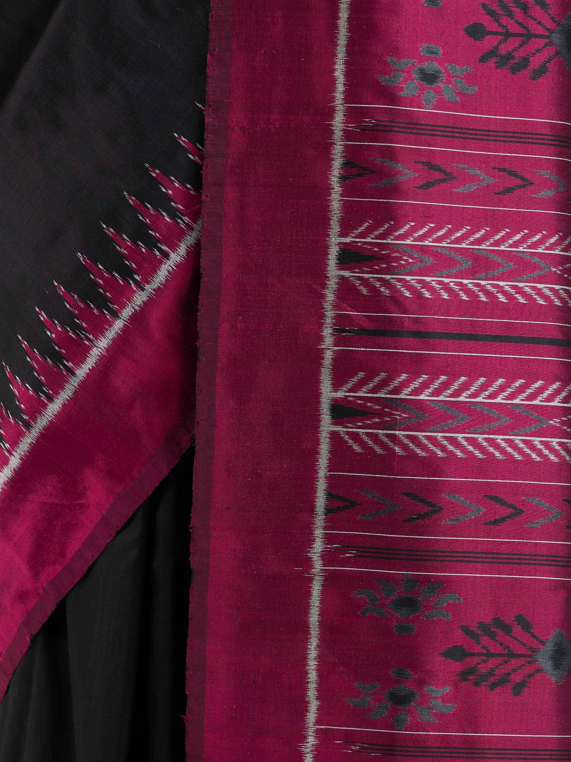 Detail view of black mulberry silk Odisha ikat bandha saree showcasing craftsmanship