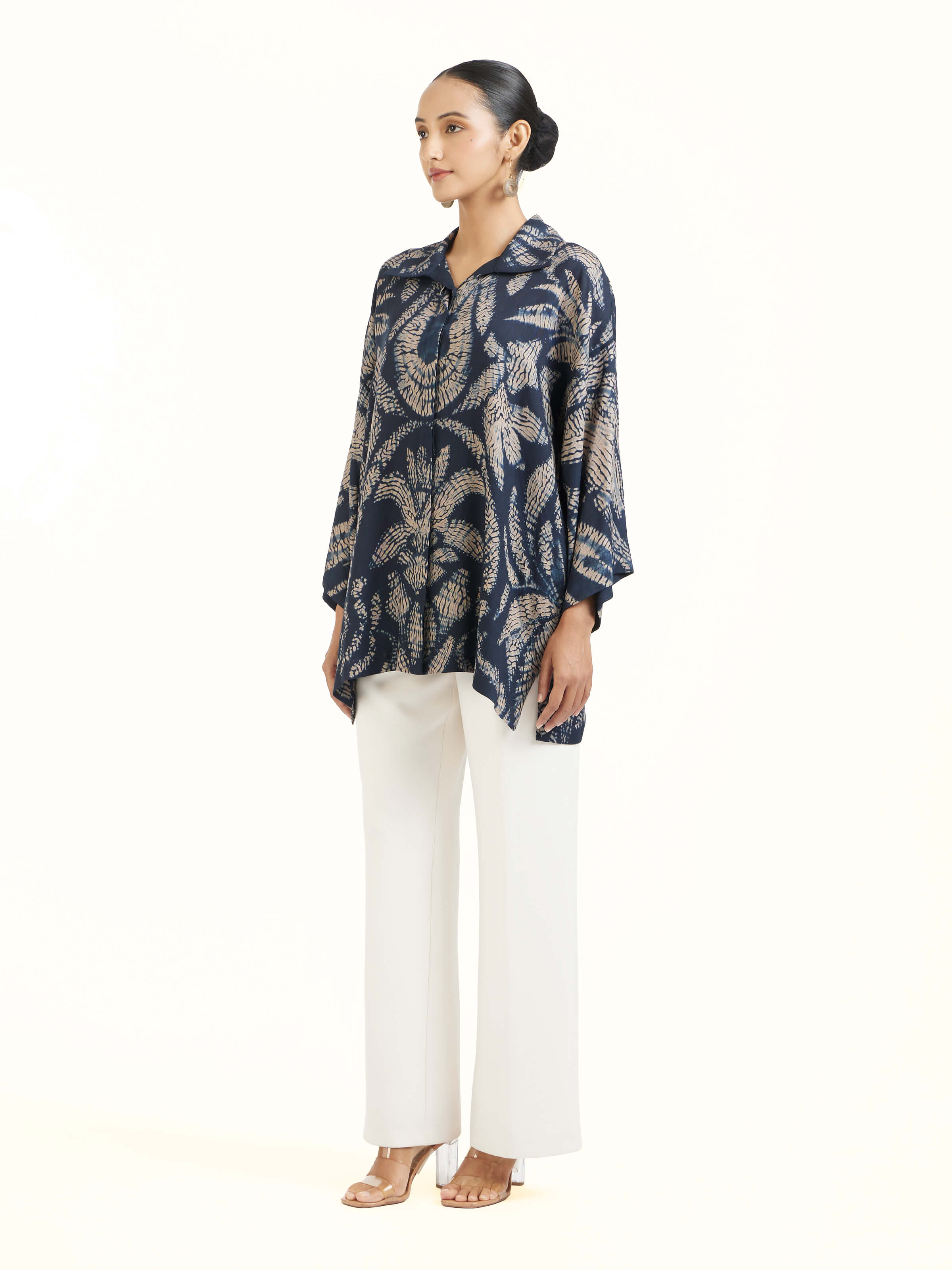 Side view of blue modal shibori shirt highlighting soft drape and relaxed fit
