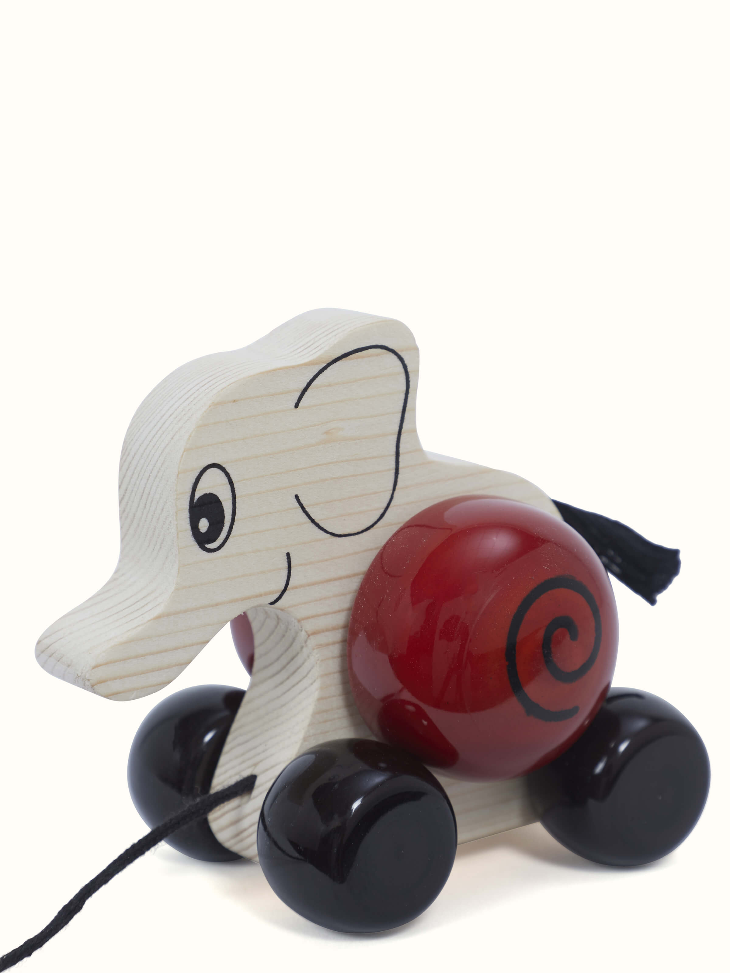 Close-up of Channapatna Wooden Elifa Toy focusing on the intricate woodwork and colorful accents.