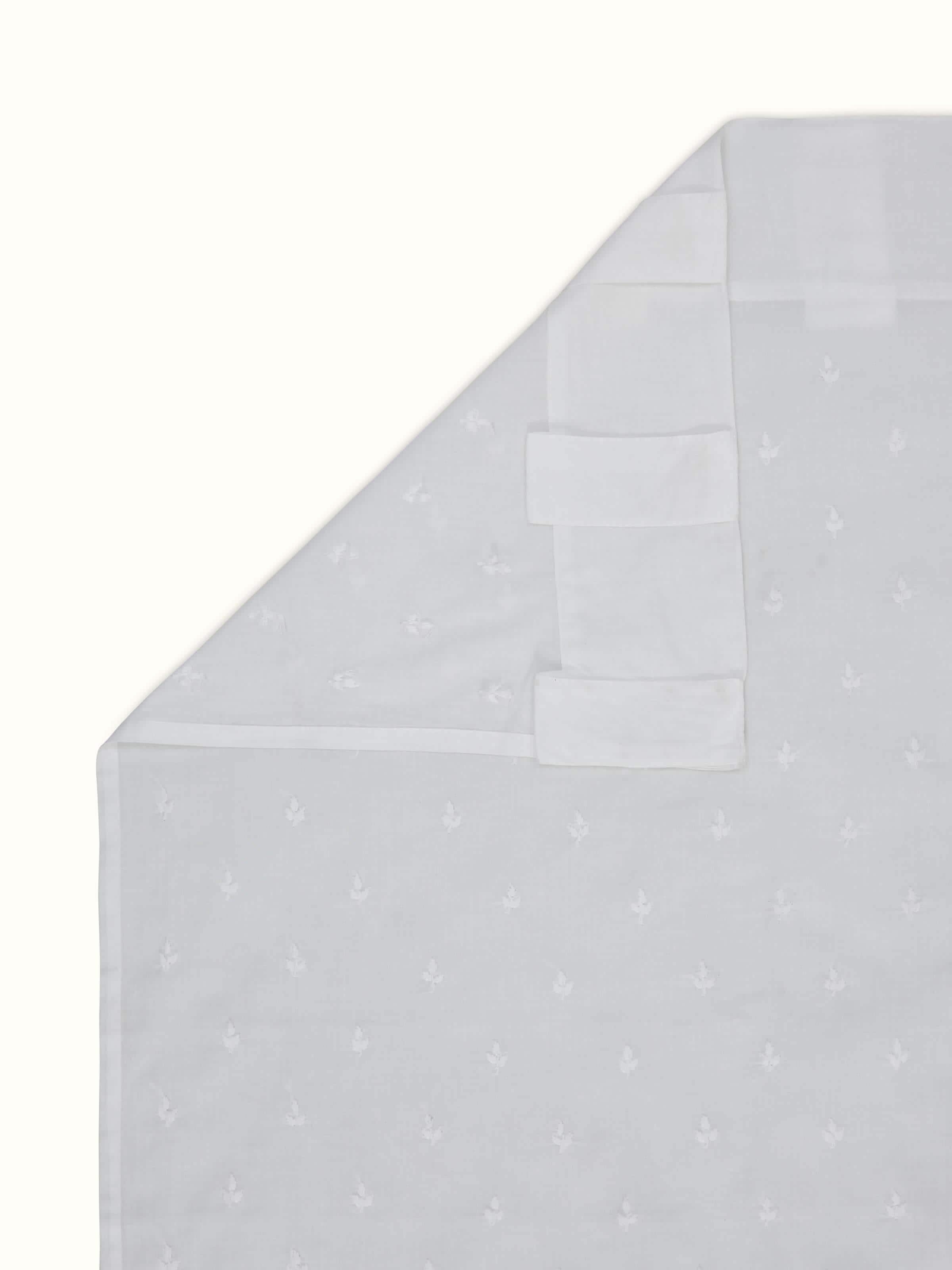 Back view of sheer cotton curtain with trellis Chikankari pattern.