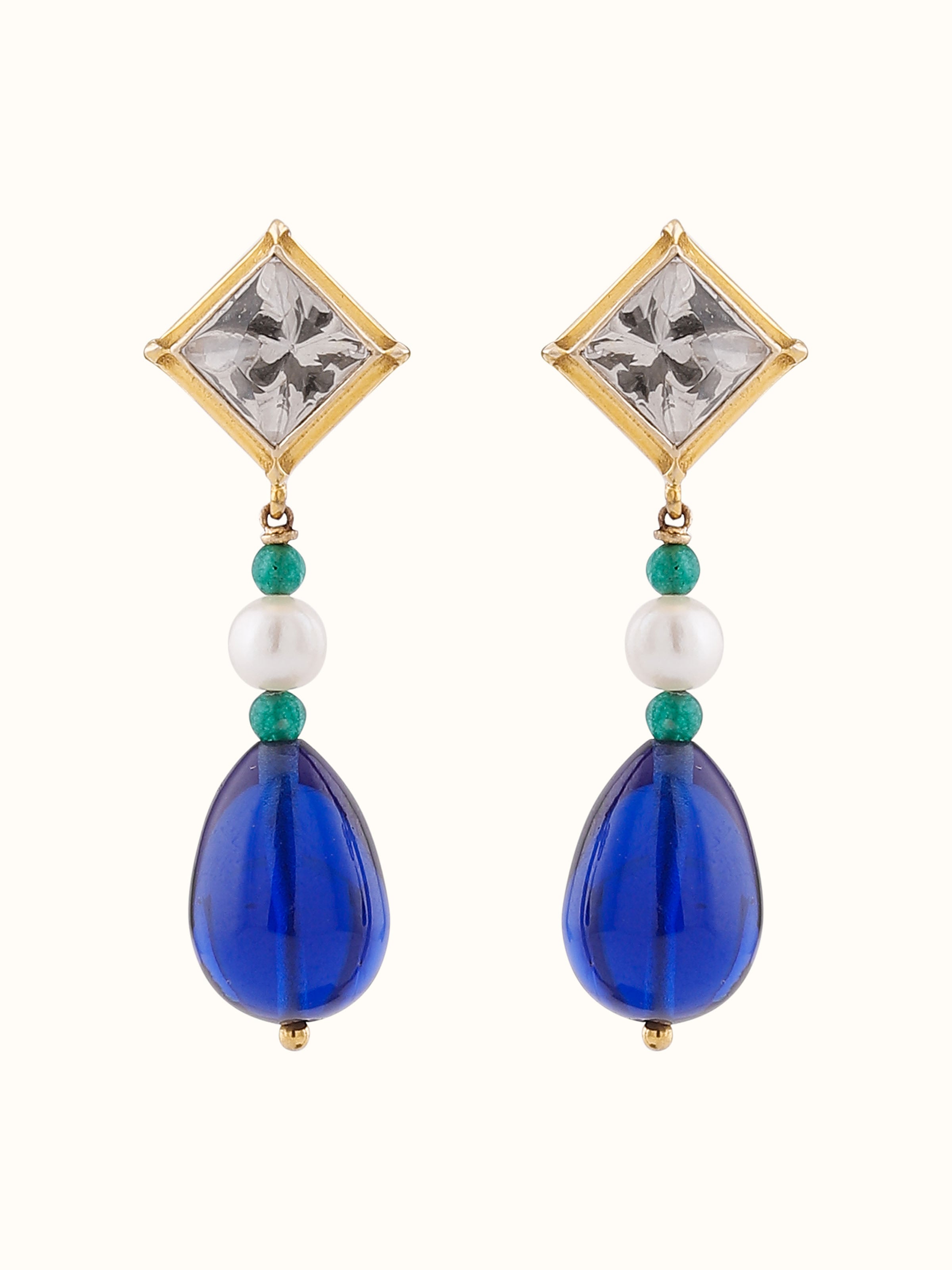 Front view of Dank Polki gold drop earrings with uncut Polki stones in a heritage-inspired gold setting.