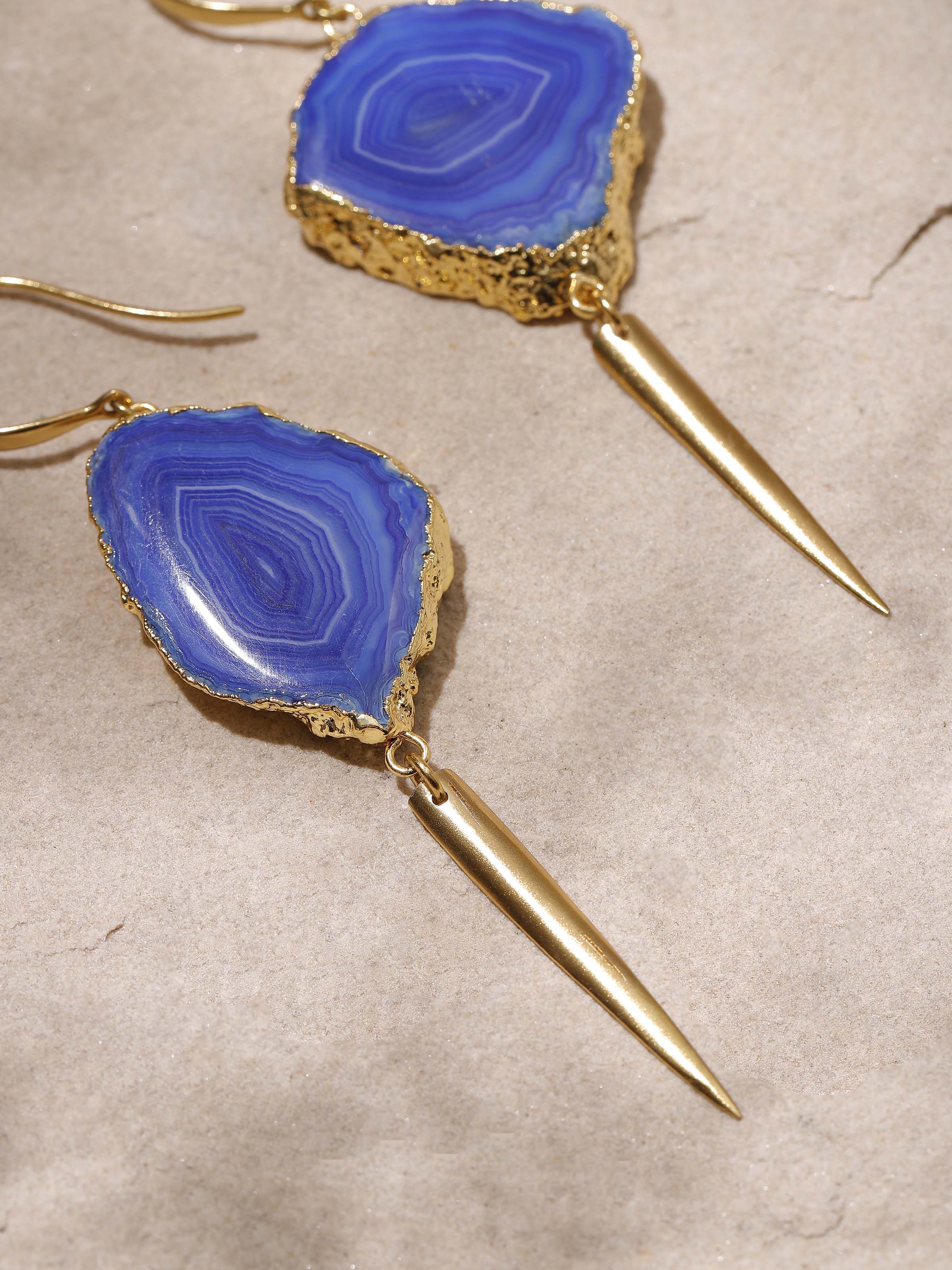 Angled view of Agate Drop Earrings displaying their elegant drop and hook design