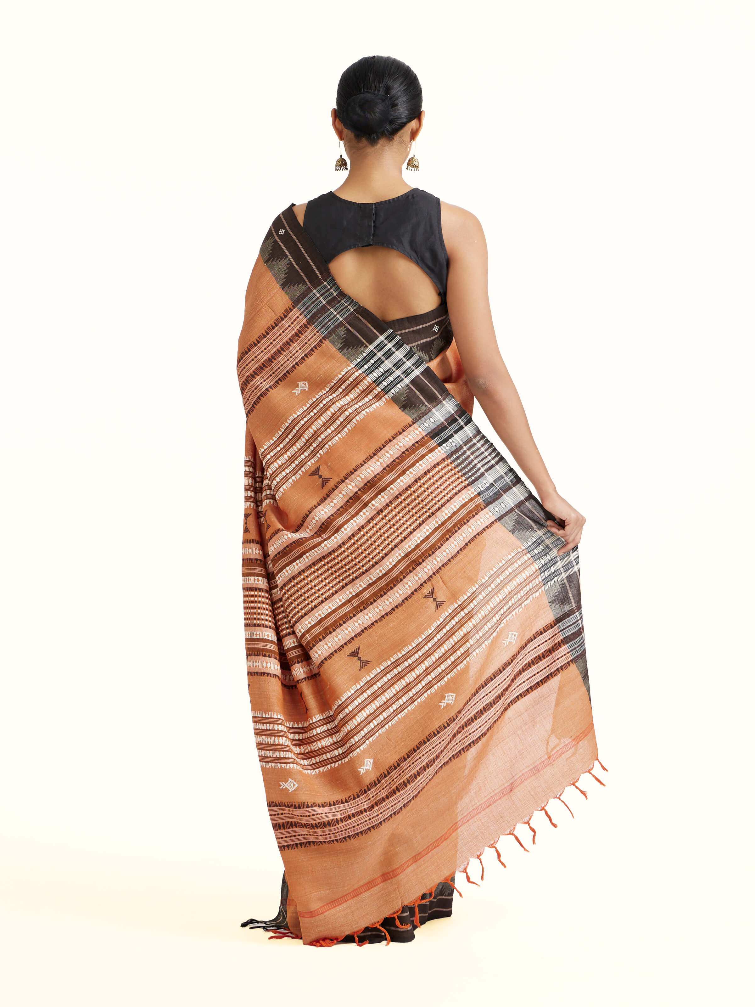 Back view of Brown Cotton Tussar Silk Kotpad Saree emphasizing the overall design and fine details
