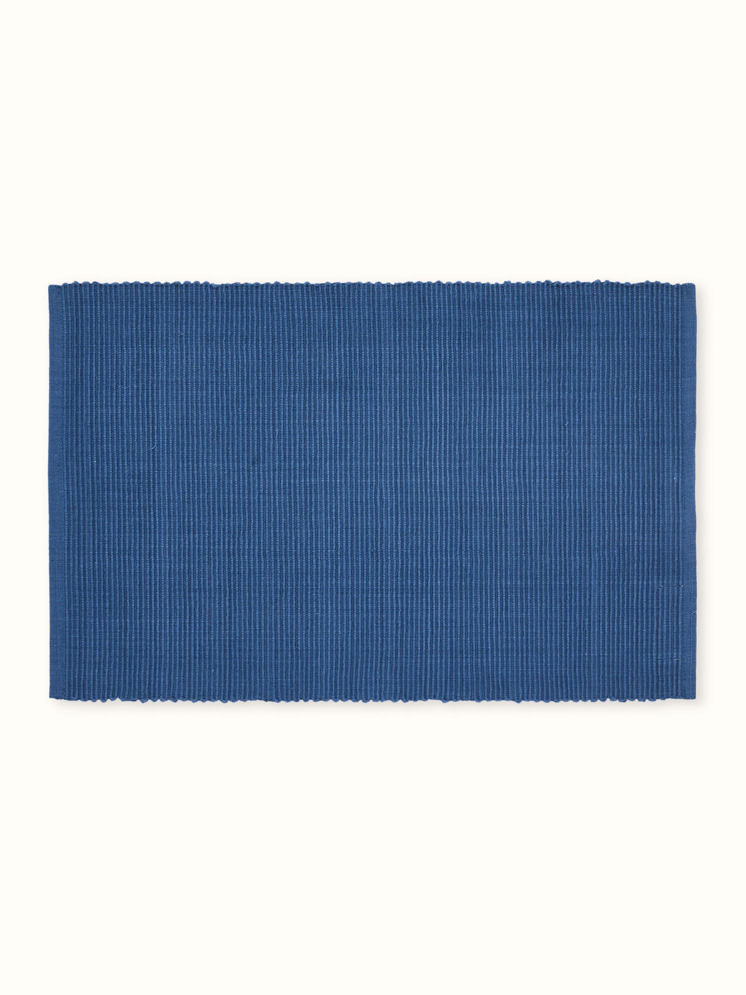 Front view showcasing the vibrant indigo color and solid cotton handloom texture of the table mats