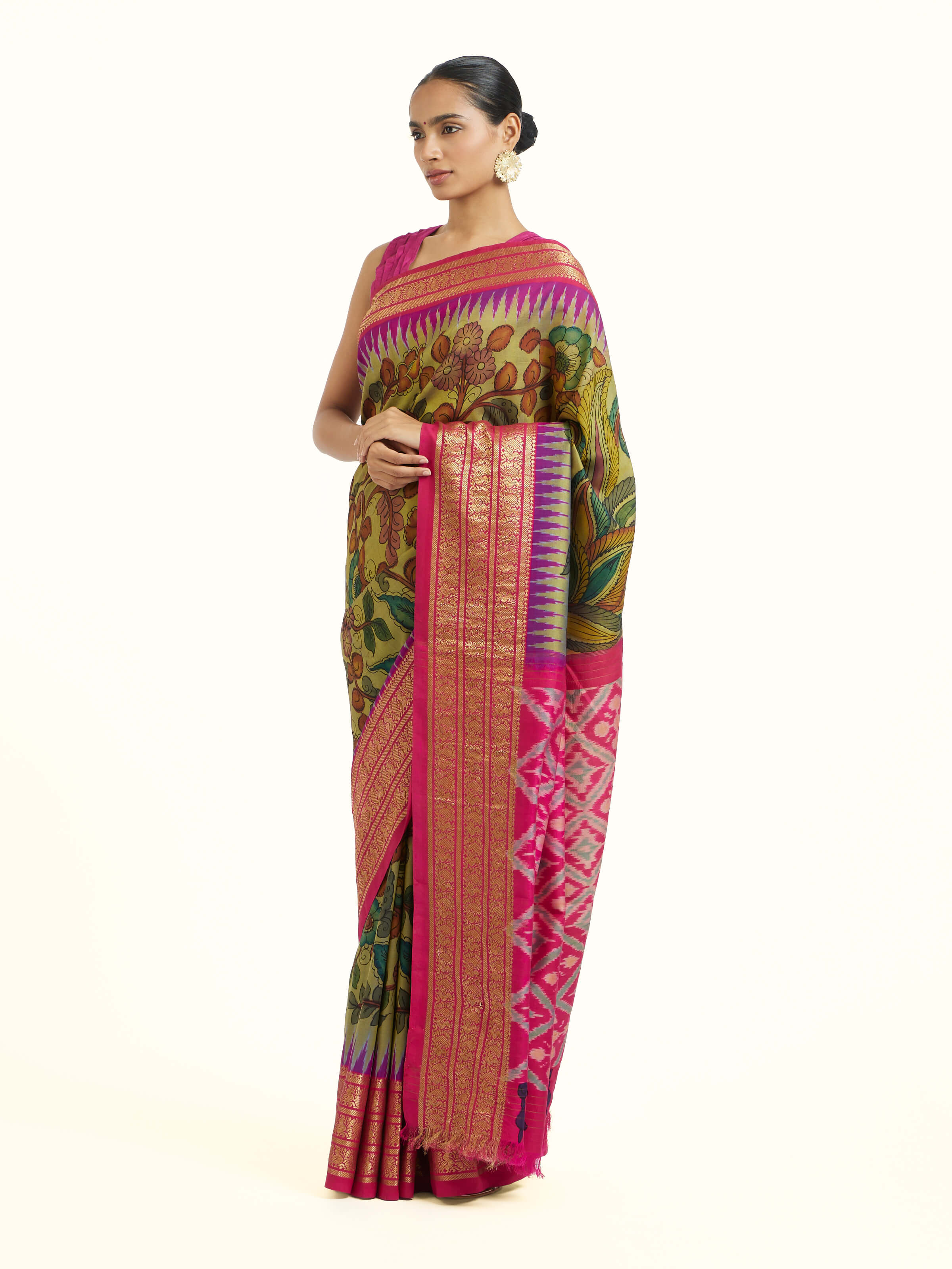 Side view of silk Ikat Kalamkari saree showcasing flowing drape