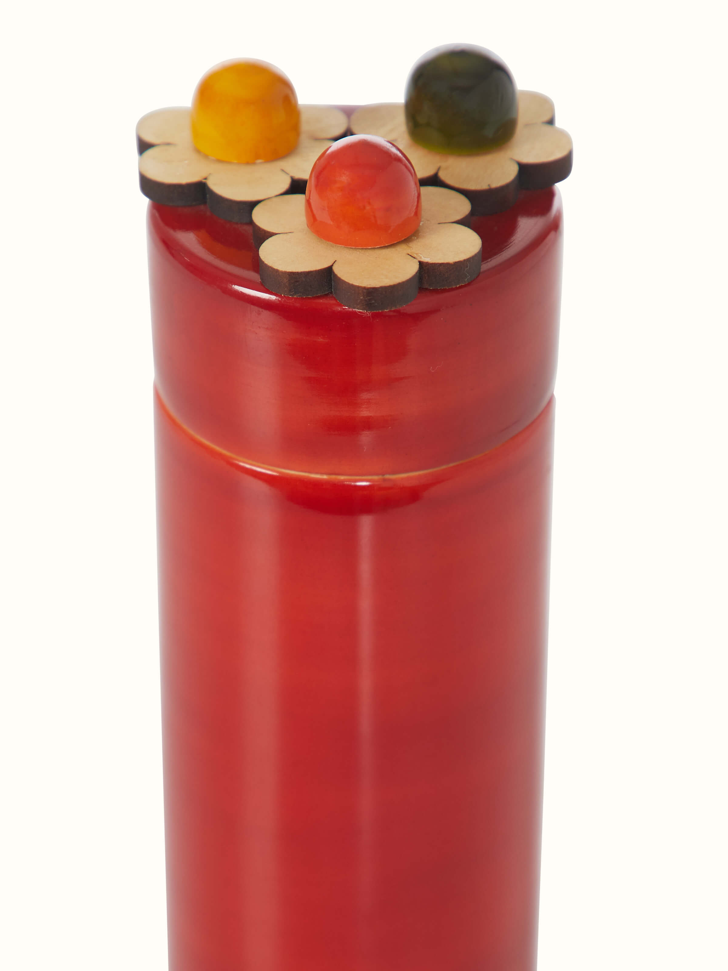 Close-up view of Channapatna Ivory Wood Sketch Kase Red from Swadesh focusing on the intricate wood carving and rich texture