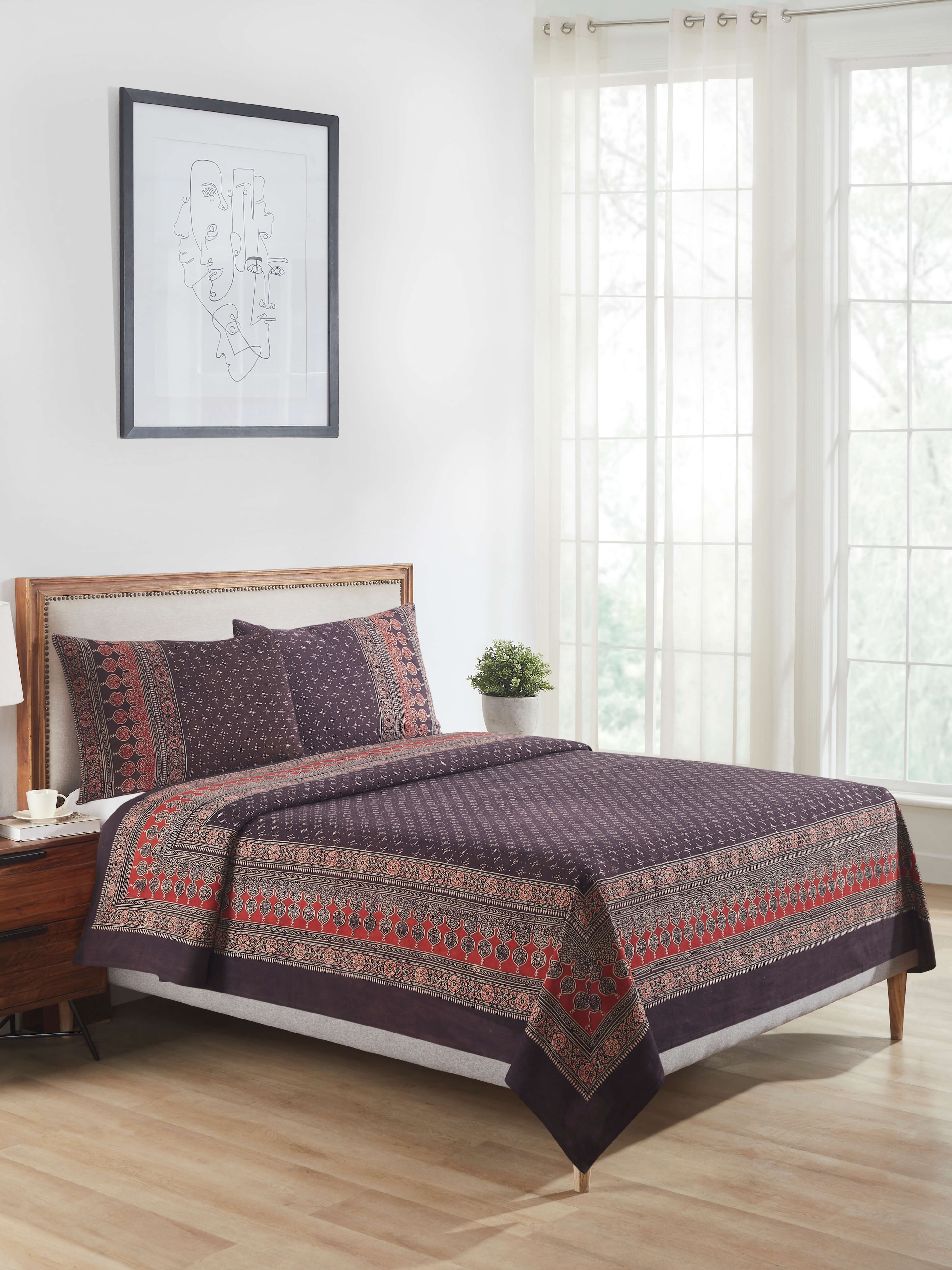 Side view of Sindh multicolour jaal cotton ajrakh block printed queen bedspread set highlighting the fabric's texture and colors