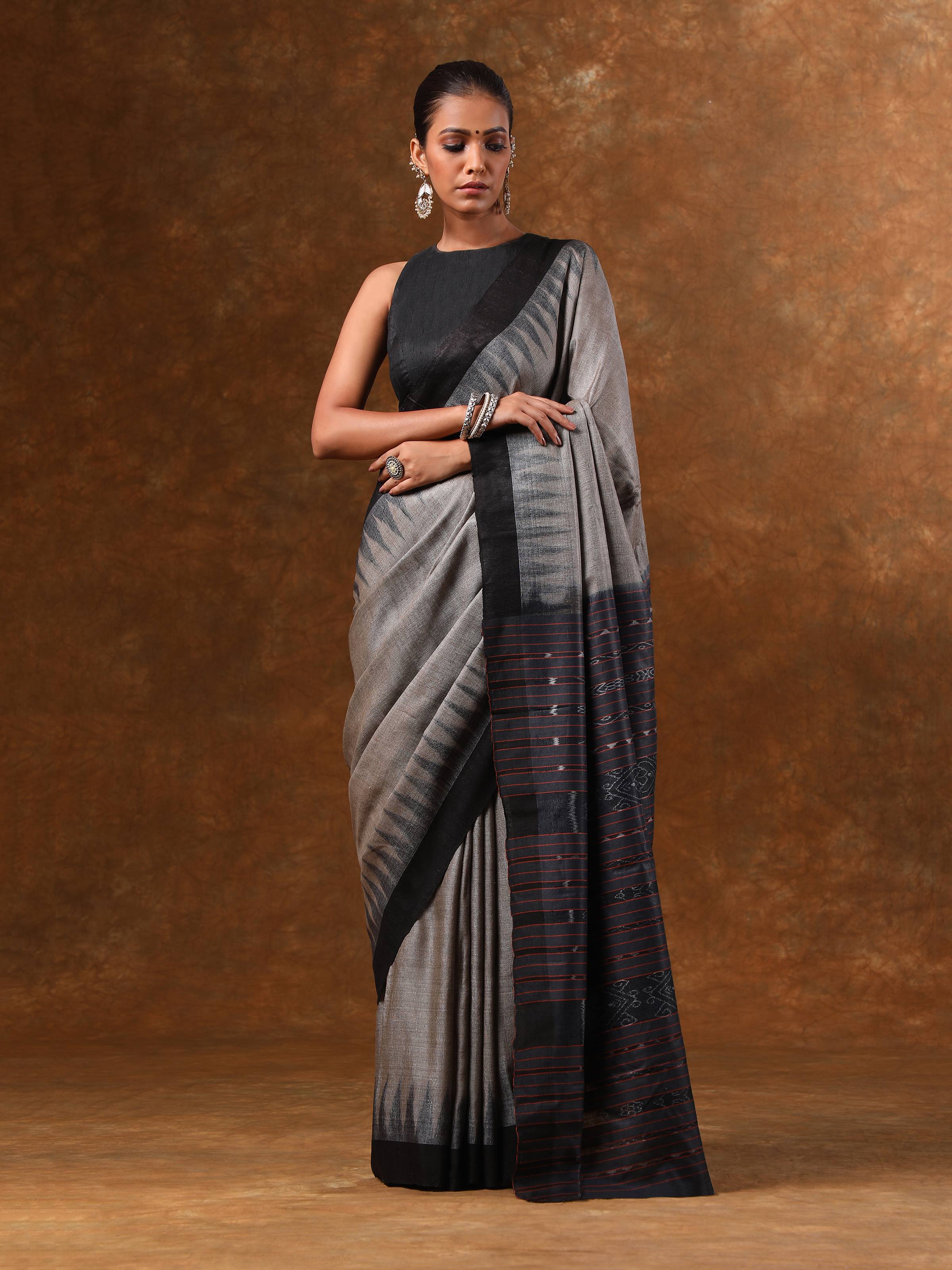 Alternate lifestyle view of green Tussar Ikat saree showcasing pallu