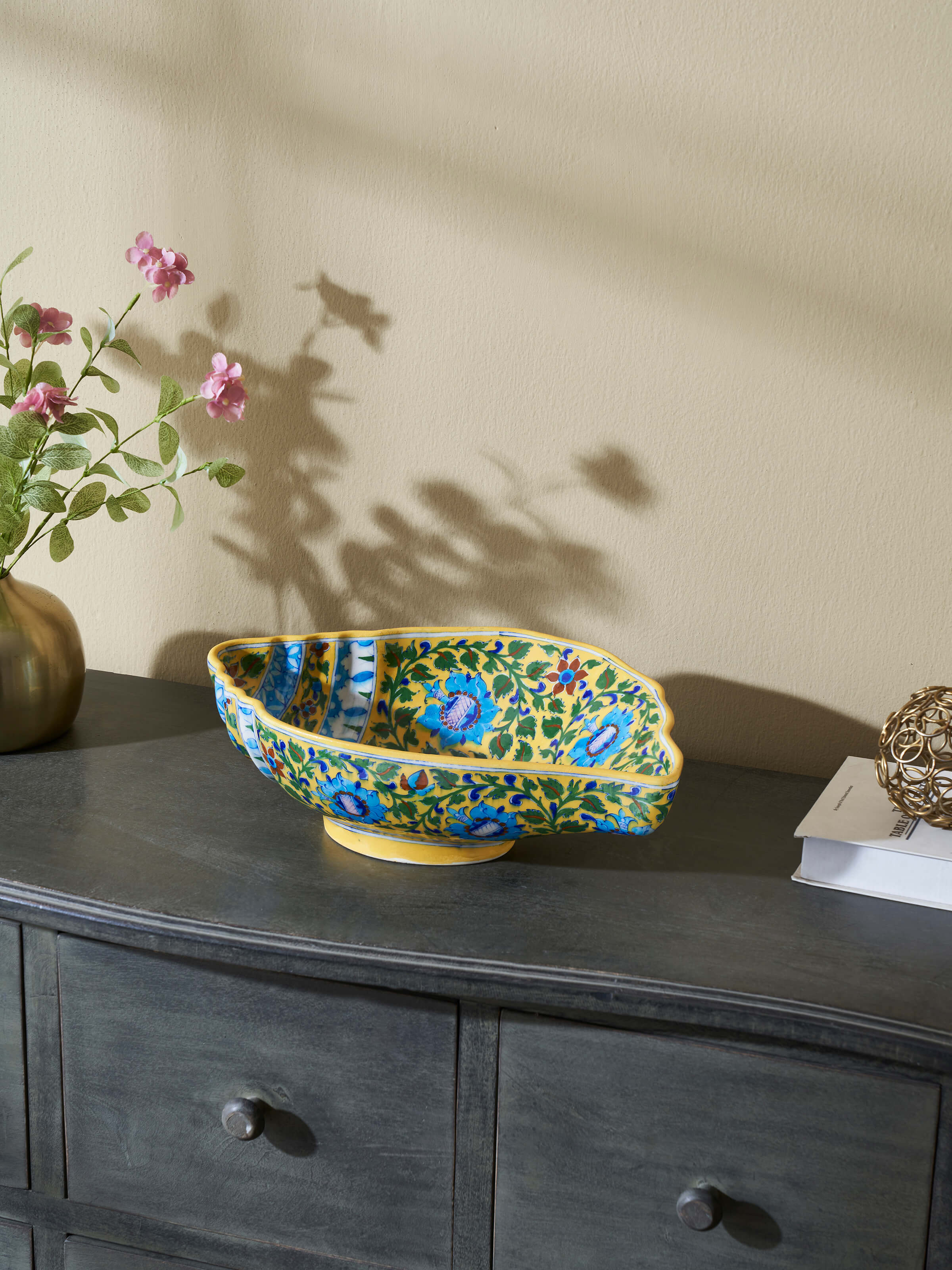 Side view of Blue pottery ceramic blossom shell artpiece multicolor