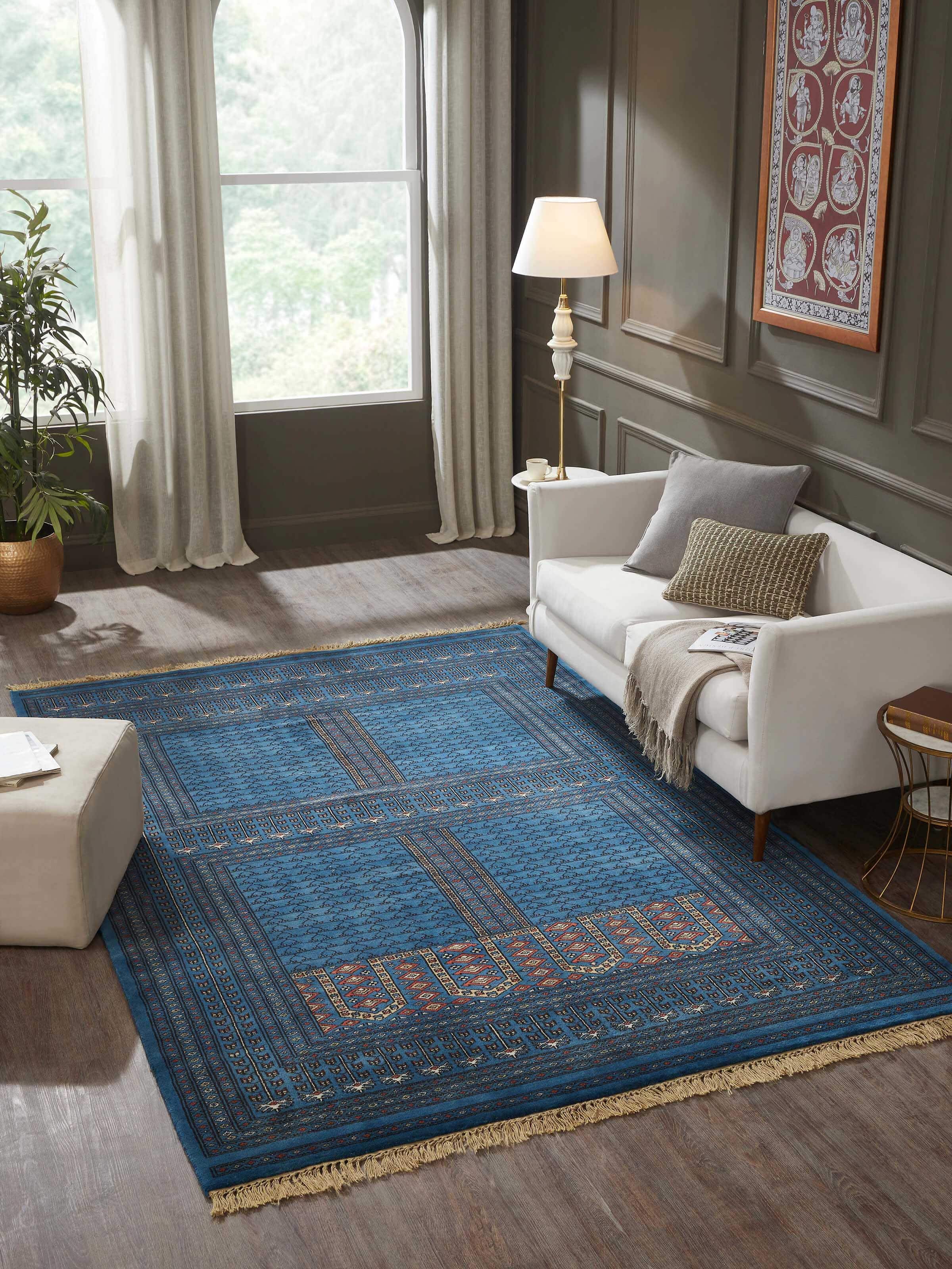 Room setup featuring Amritsari Parda Blue Gwalior Wool Rug, hand-knotted in deep blue tones, elegant and timeless by Swadesh