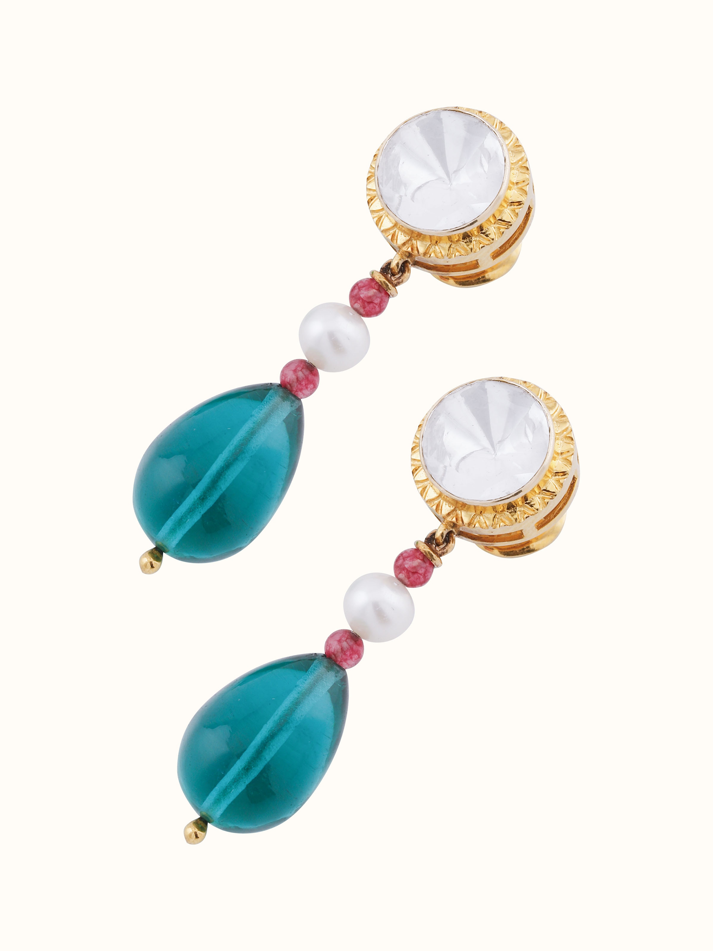 Overhead view showing full shape and elegant traditional design of alternate Polki earrings.