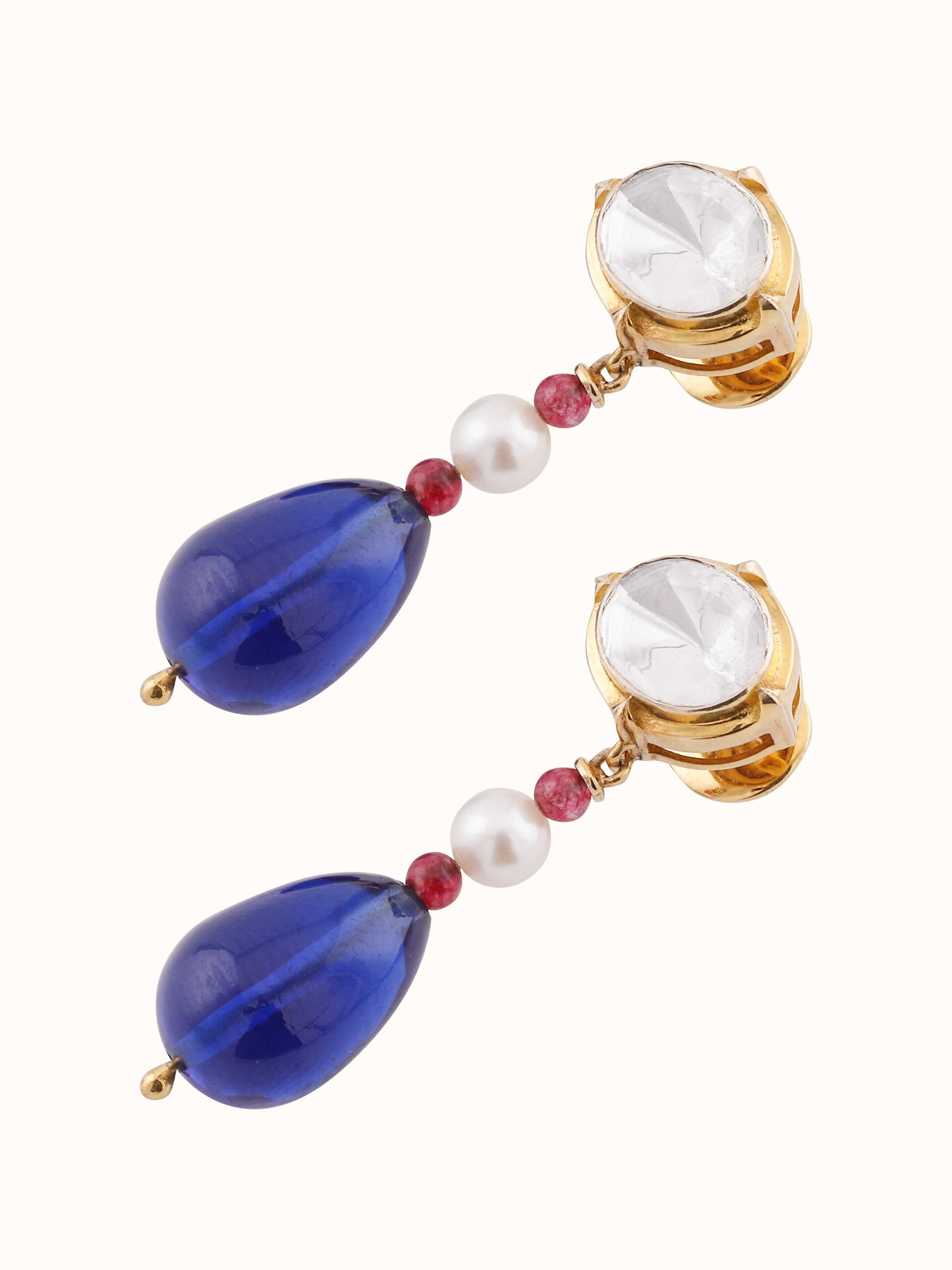 Detail shot capturing the fine setting of the Polki stones and smooth polish on the gold surface.