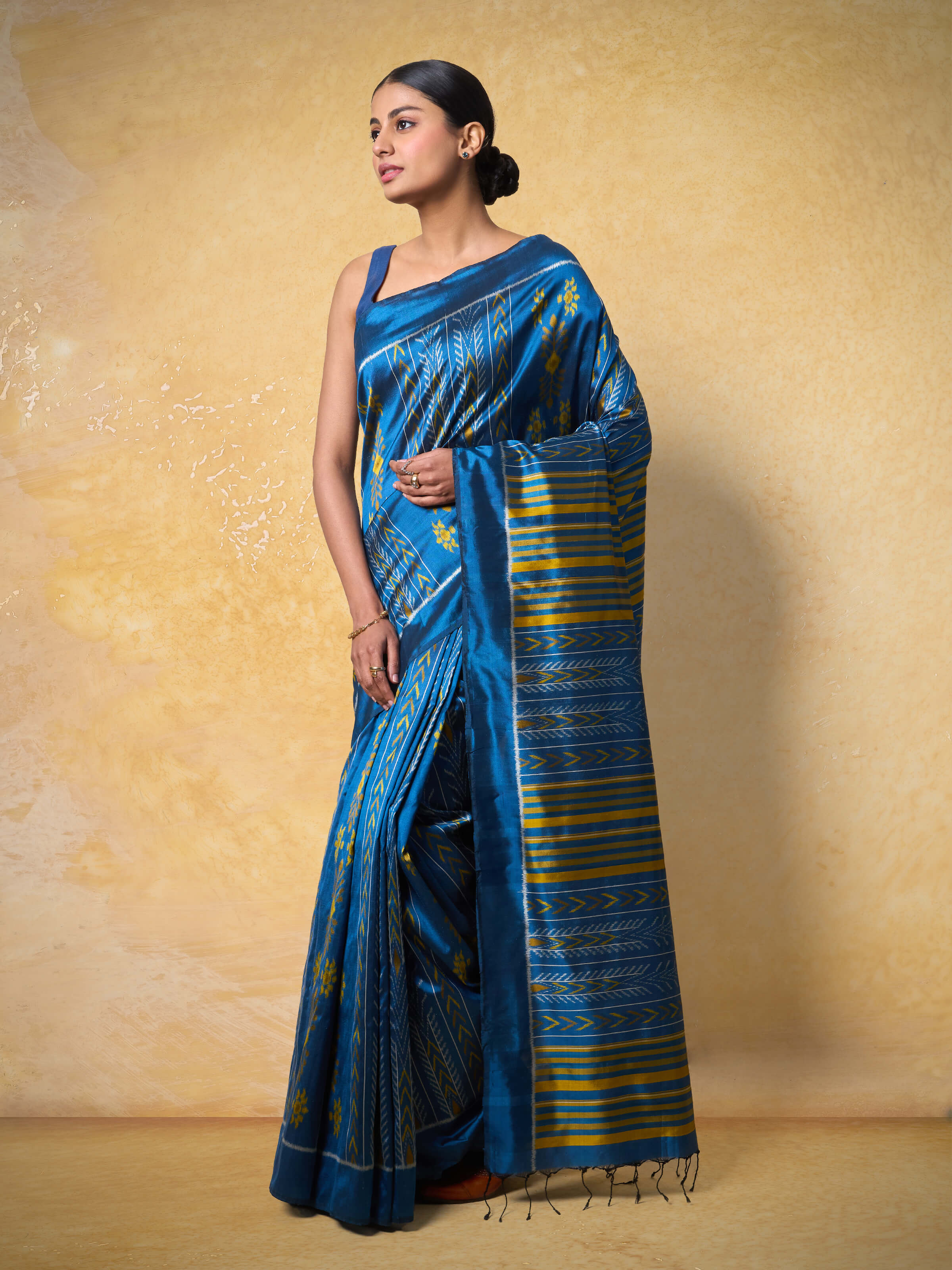Side view of Blue Mulberry Silk Odisha Ikat Saree showing its elegant drape and design.