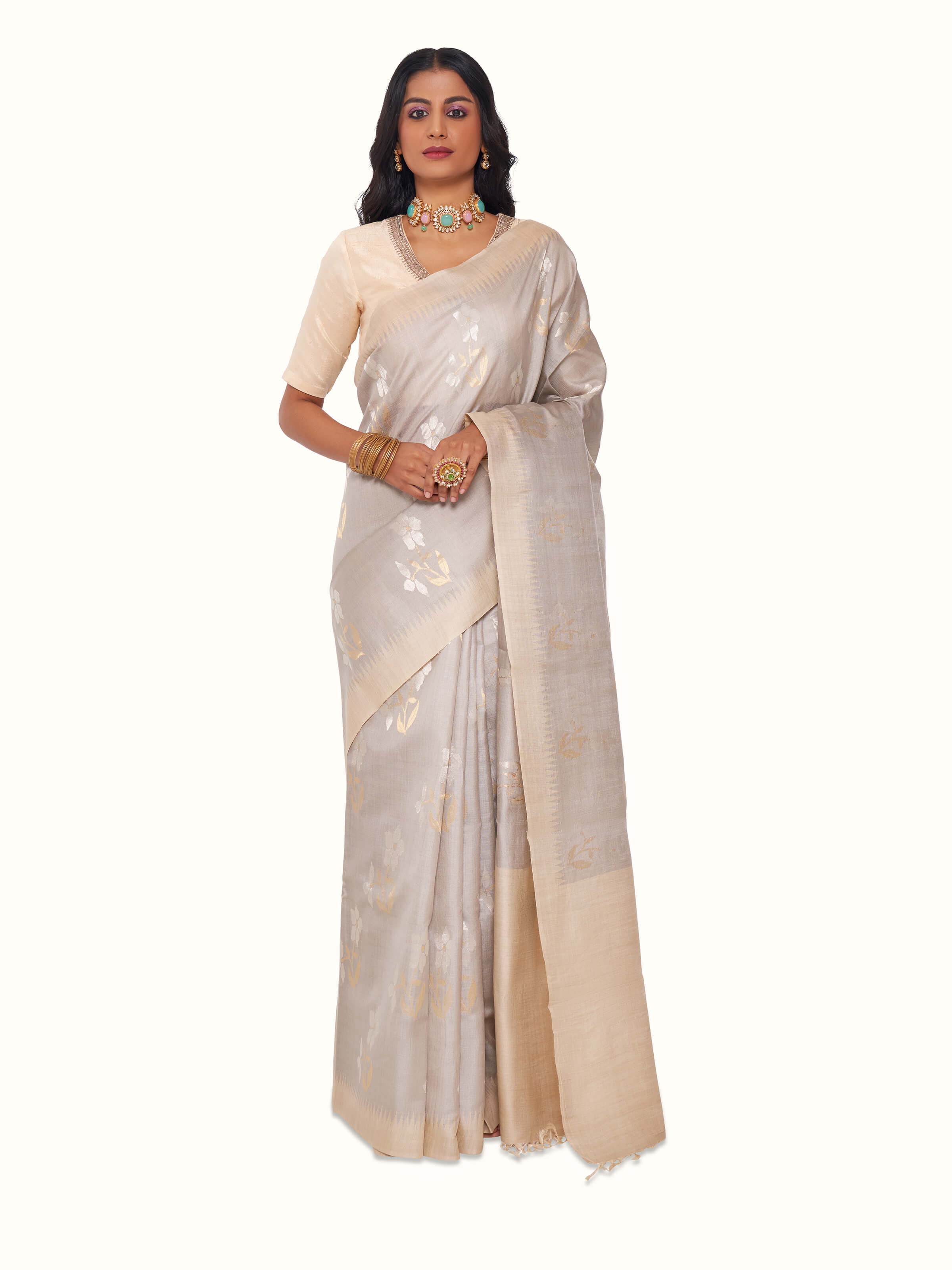 Front view of ecru tussar silk saree with natural texture