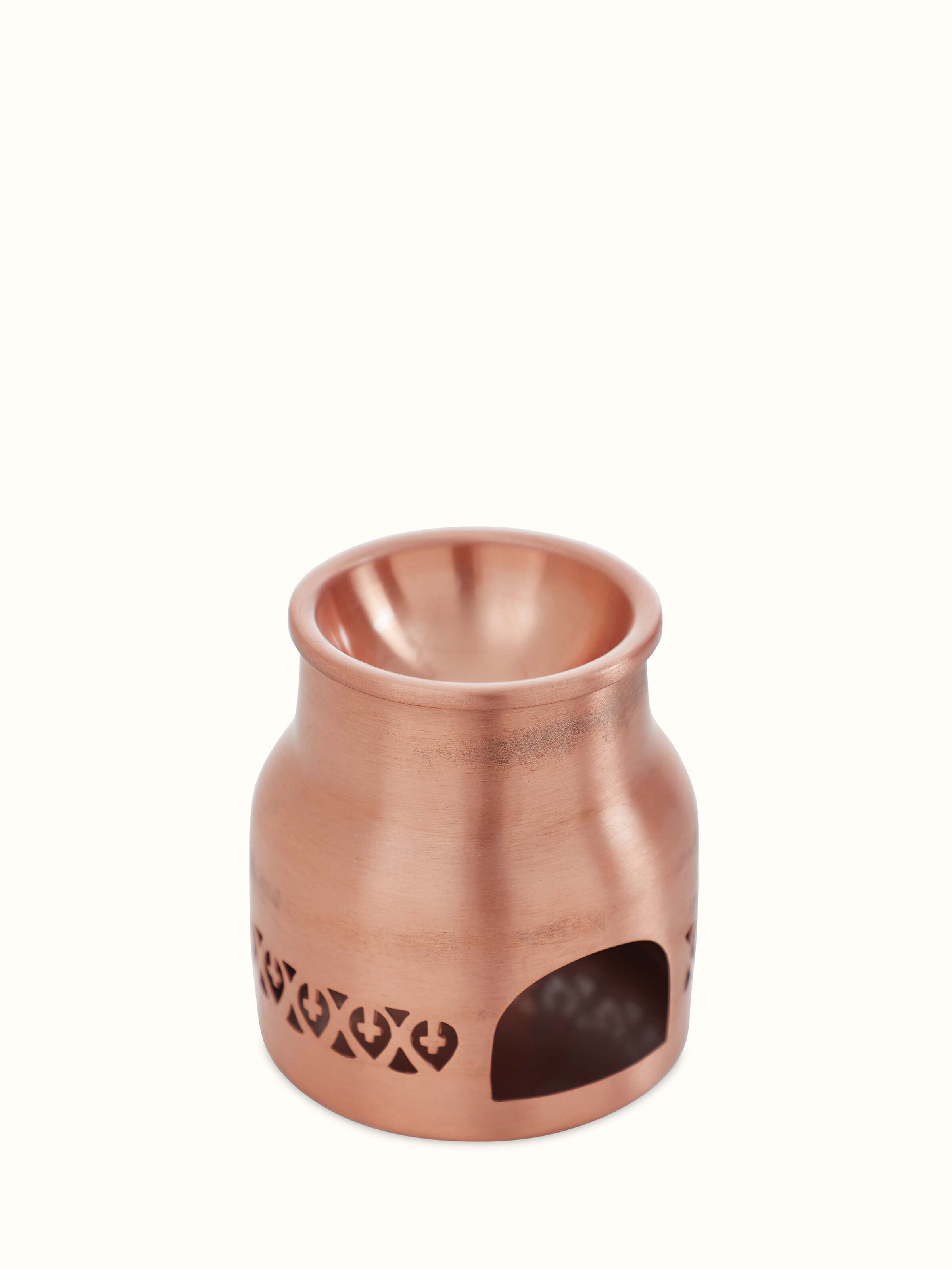 Artistic view of Swadesh Traditional Copper Diffuser focusing on its ornate details and polished texture.