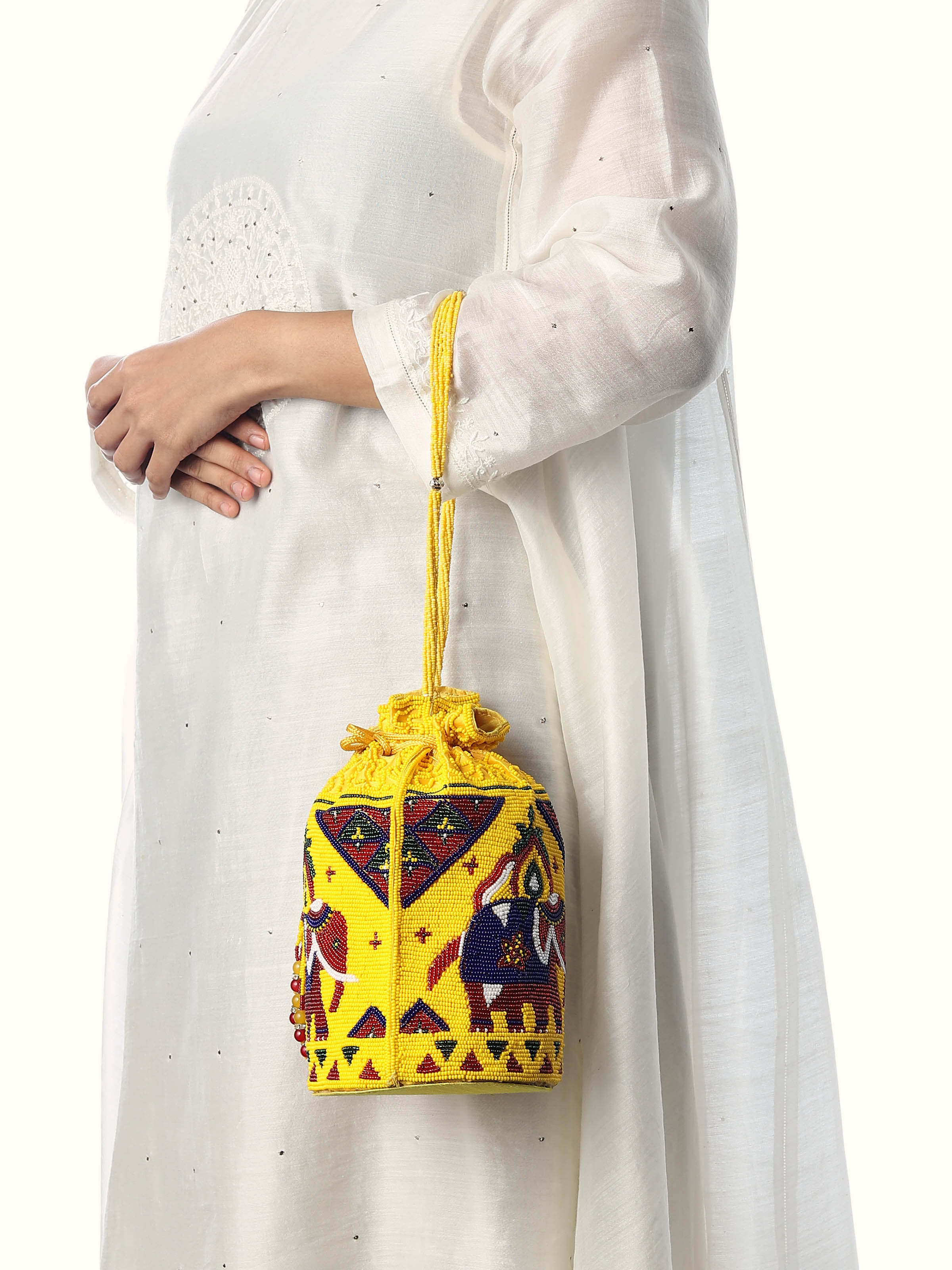 Side view of silk beadwork potli bag showing drawstring closure
