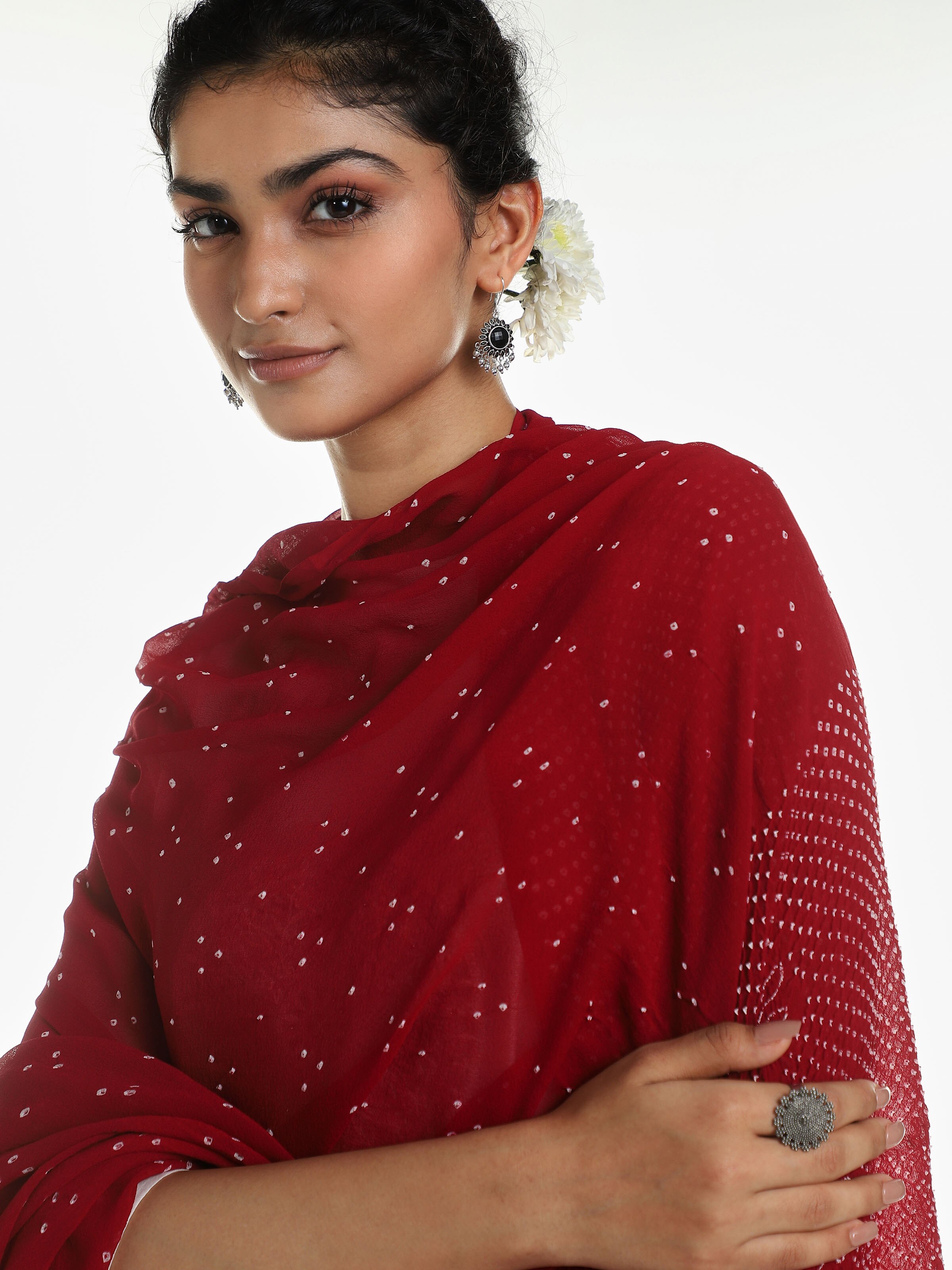 Side view of red georgette Bandhani tie and dye dupatta showing border and motifs