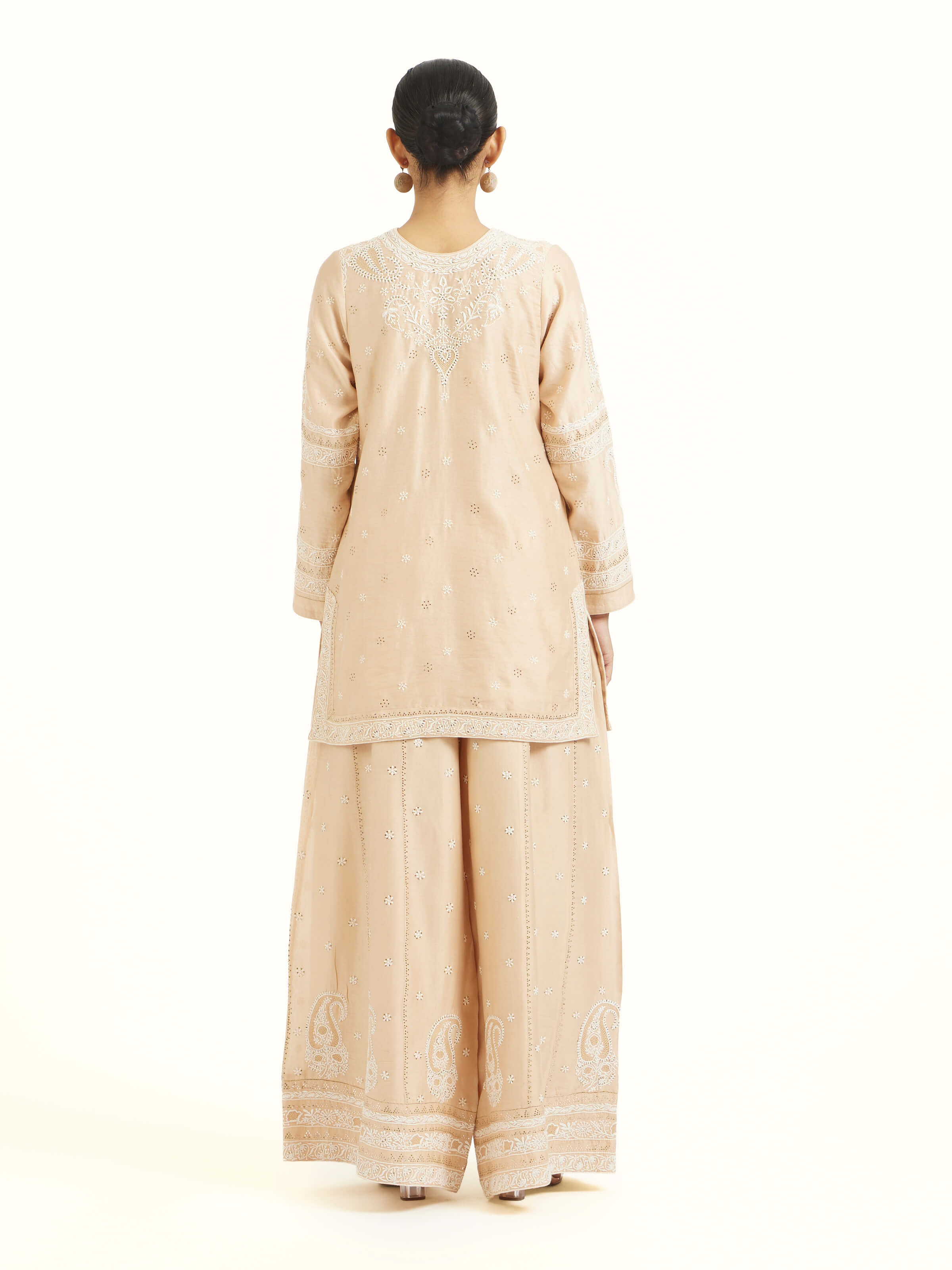 Back view of beige silk Chanderi kalidar sharara displaying overall design