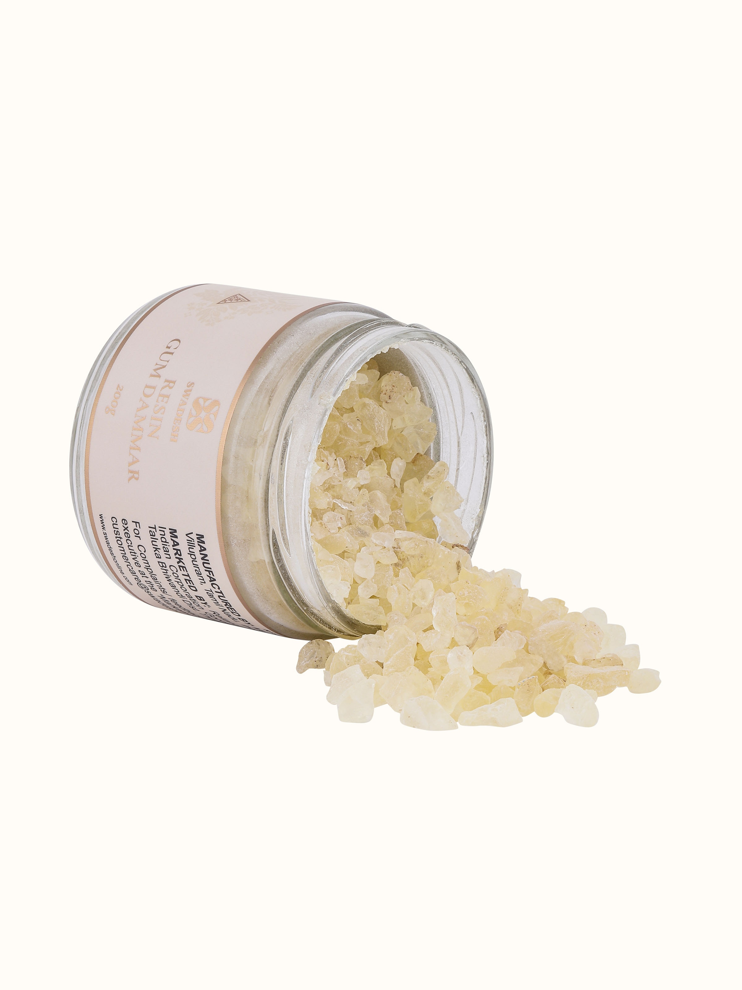 Detail display of Dammar Resin emphasizing its organic quality and golden hues