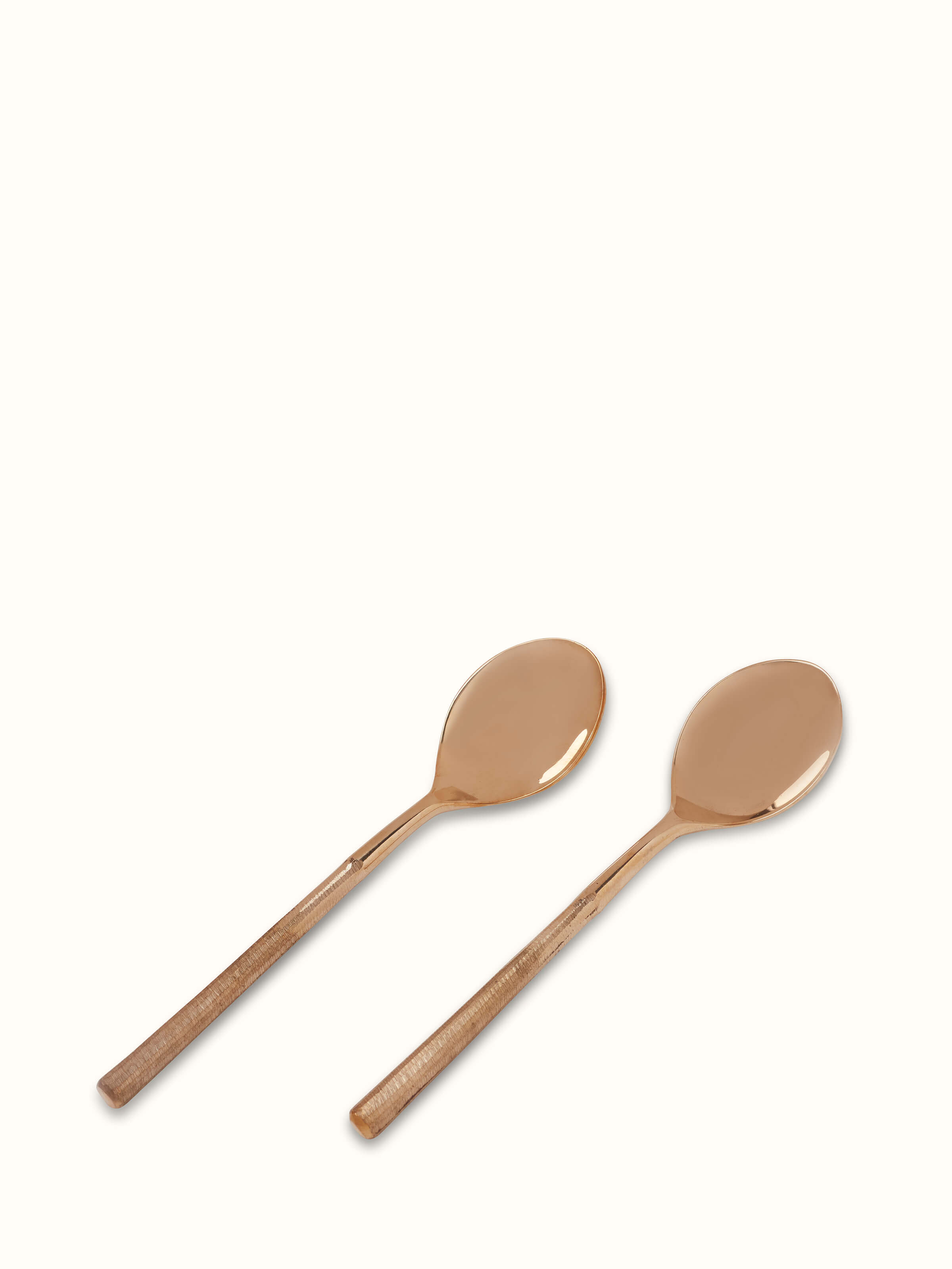Angled view of Bell metal teaspoon highlighting its elegant shape and durability