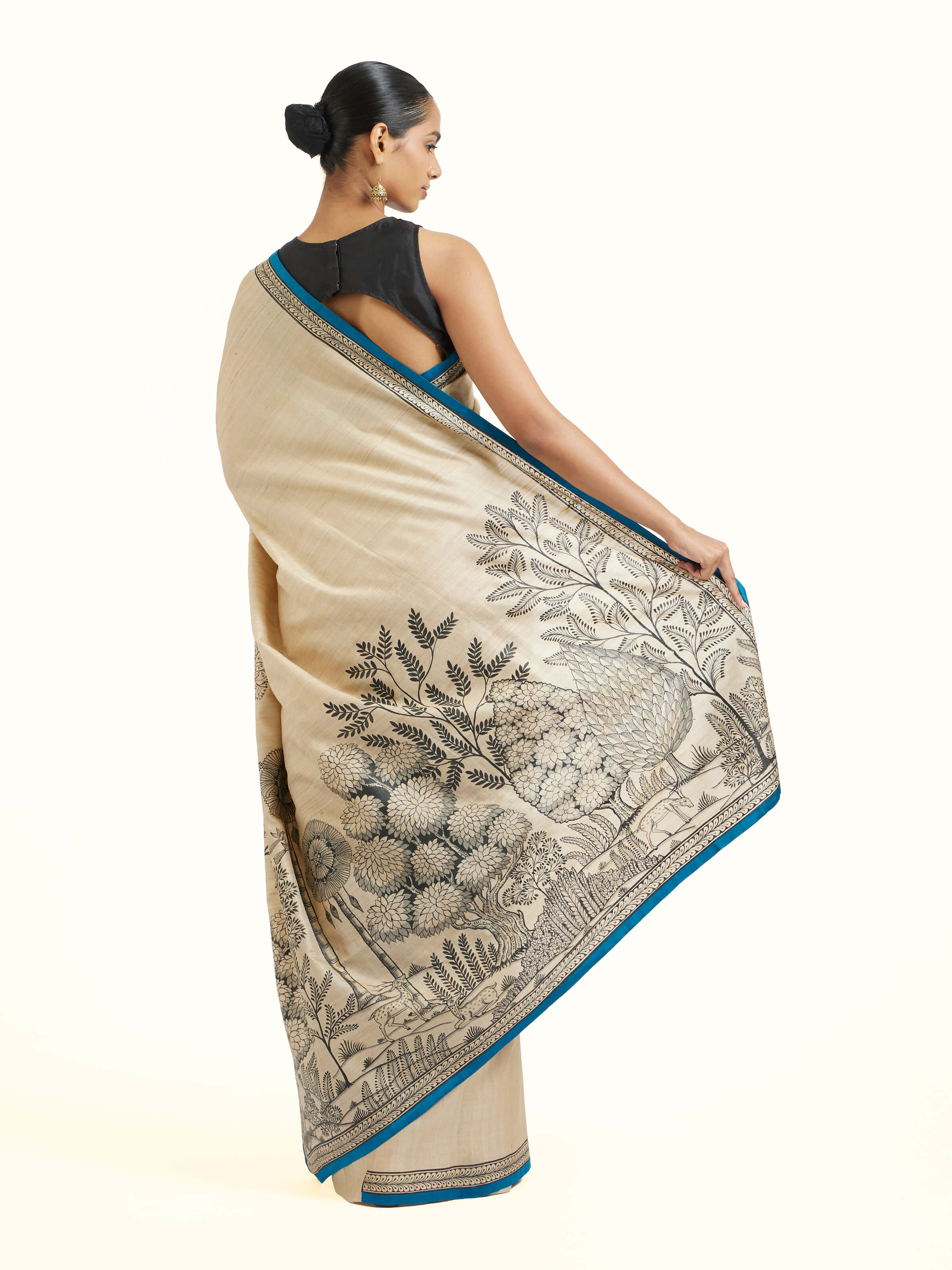 Back view of tussar silk Pattachitra saree displaying pallu design