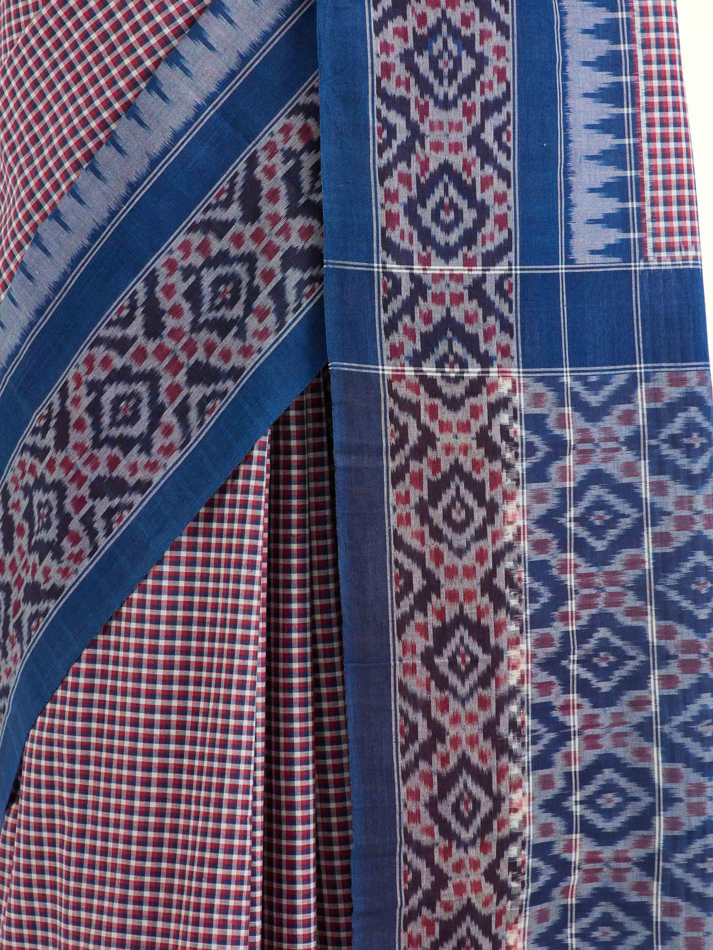 Detail view of indigo natural dyed cotton ikat saree showcasing craftsmanship