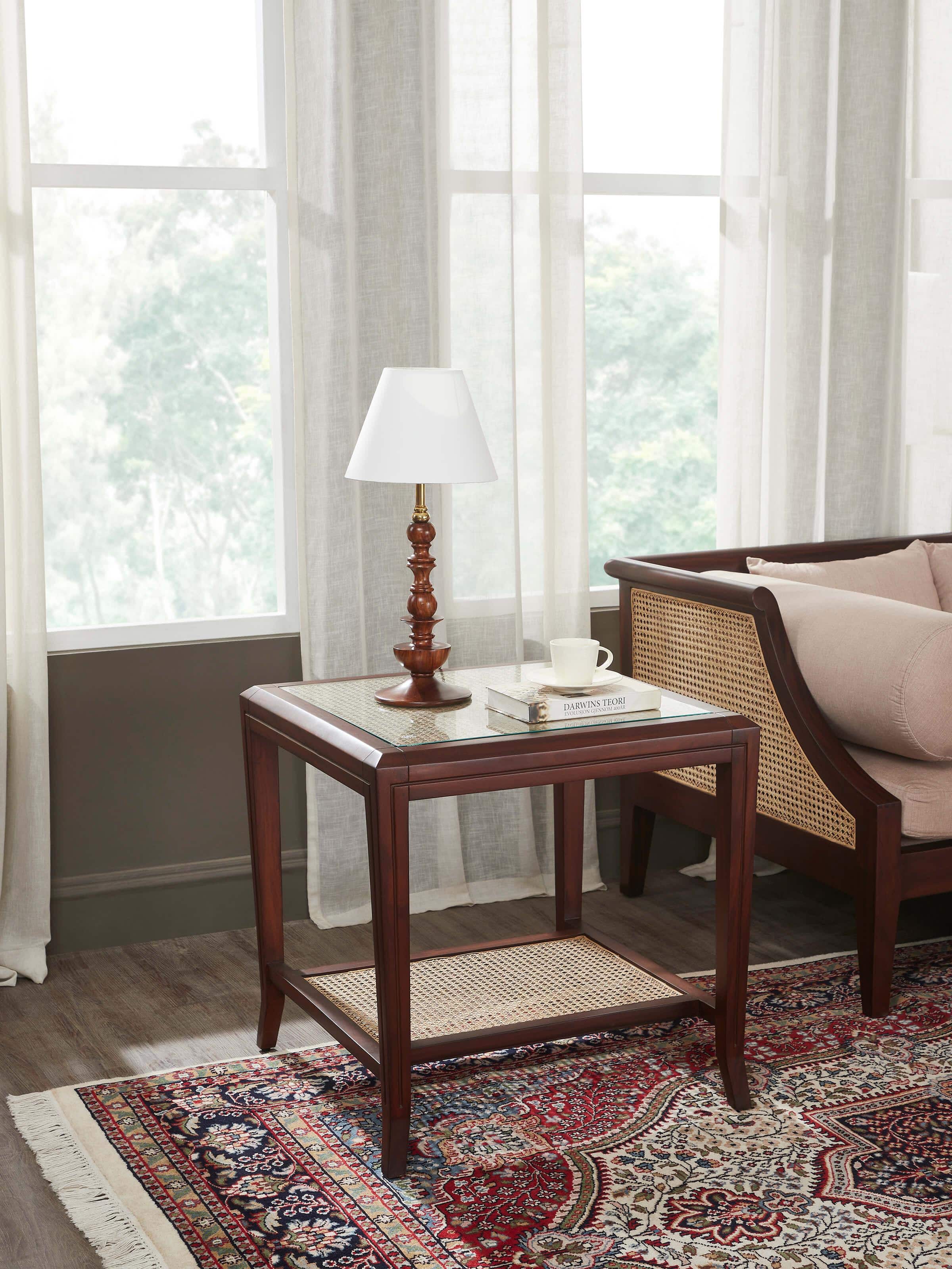 Lifestyle shot of mahogany side table placed in elegant home décor – minimal yet traditional style