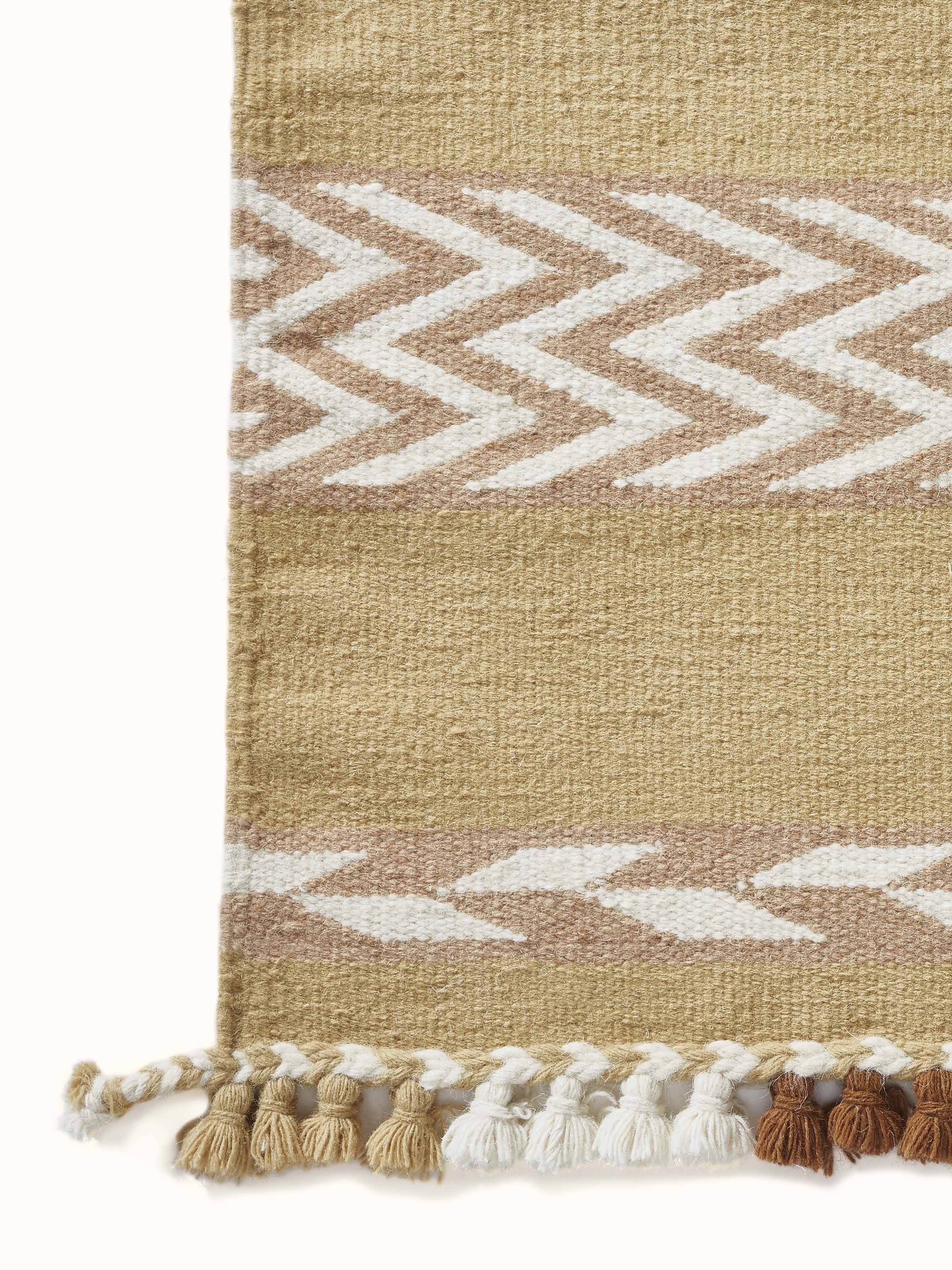 Close-up showing the dense wool fibers and intricate weaving detail