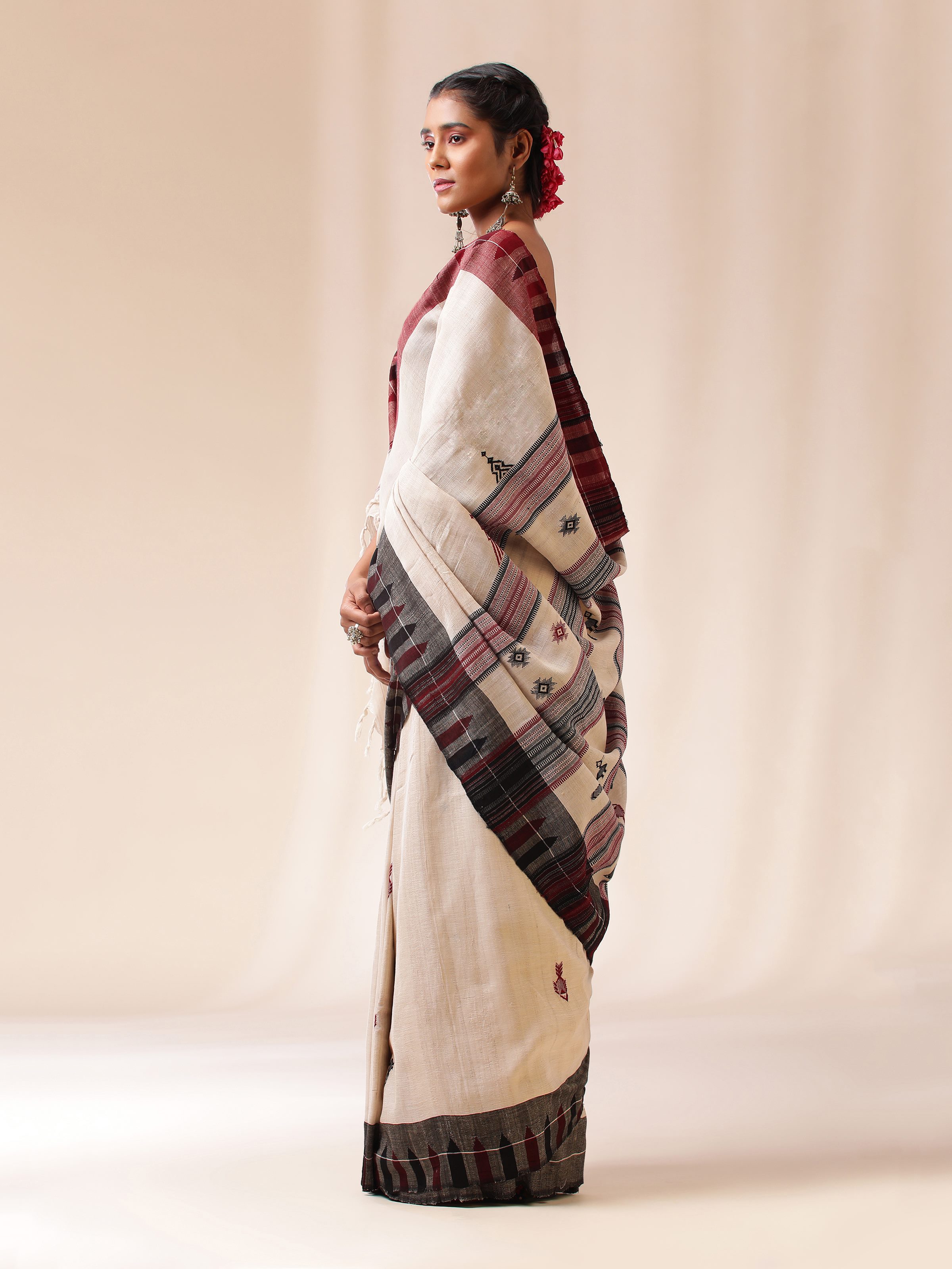 Side angle displaying handwoven texture and subtle Kotpad design.