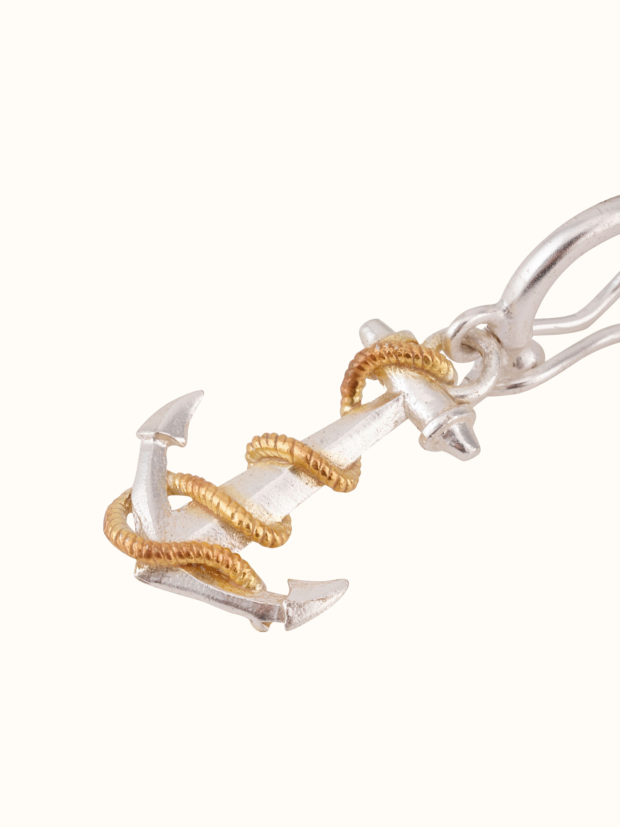 Side view of silver smithing pendant