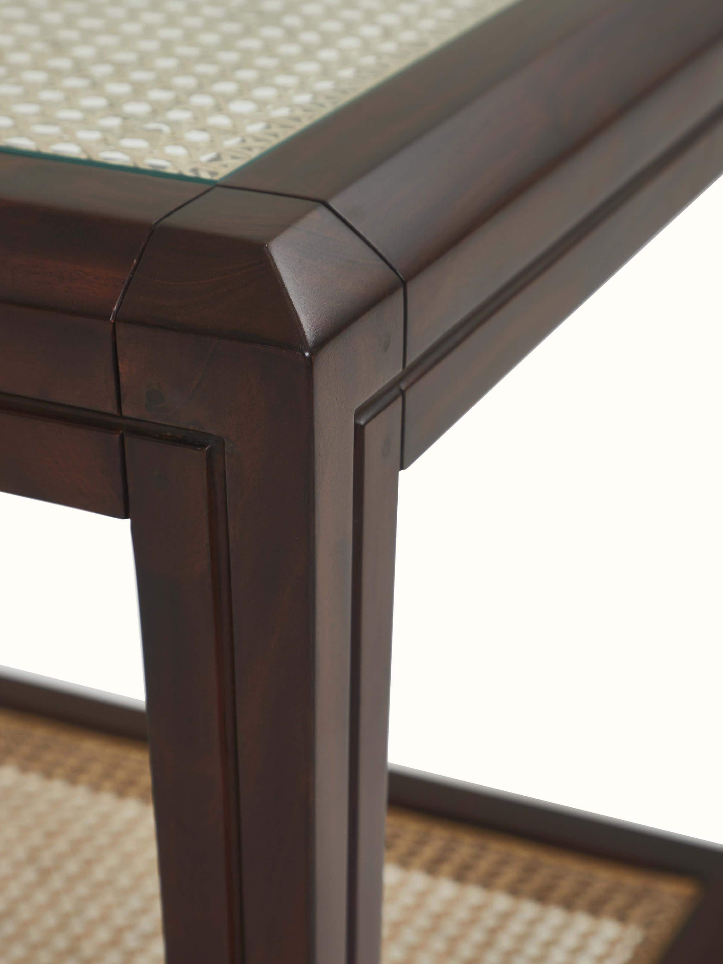 Detailed side profile of mahogany end table with curved edge and sturdy base – durable Indian craftsmanship