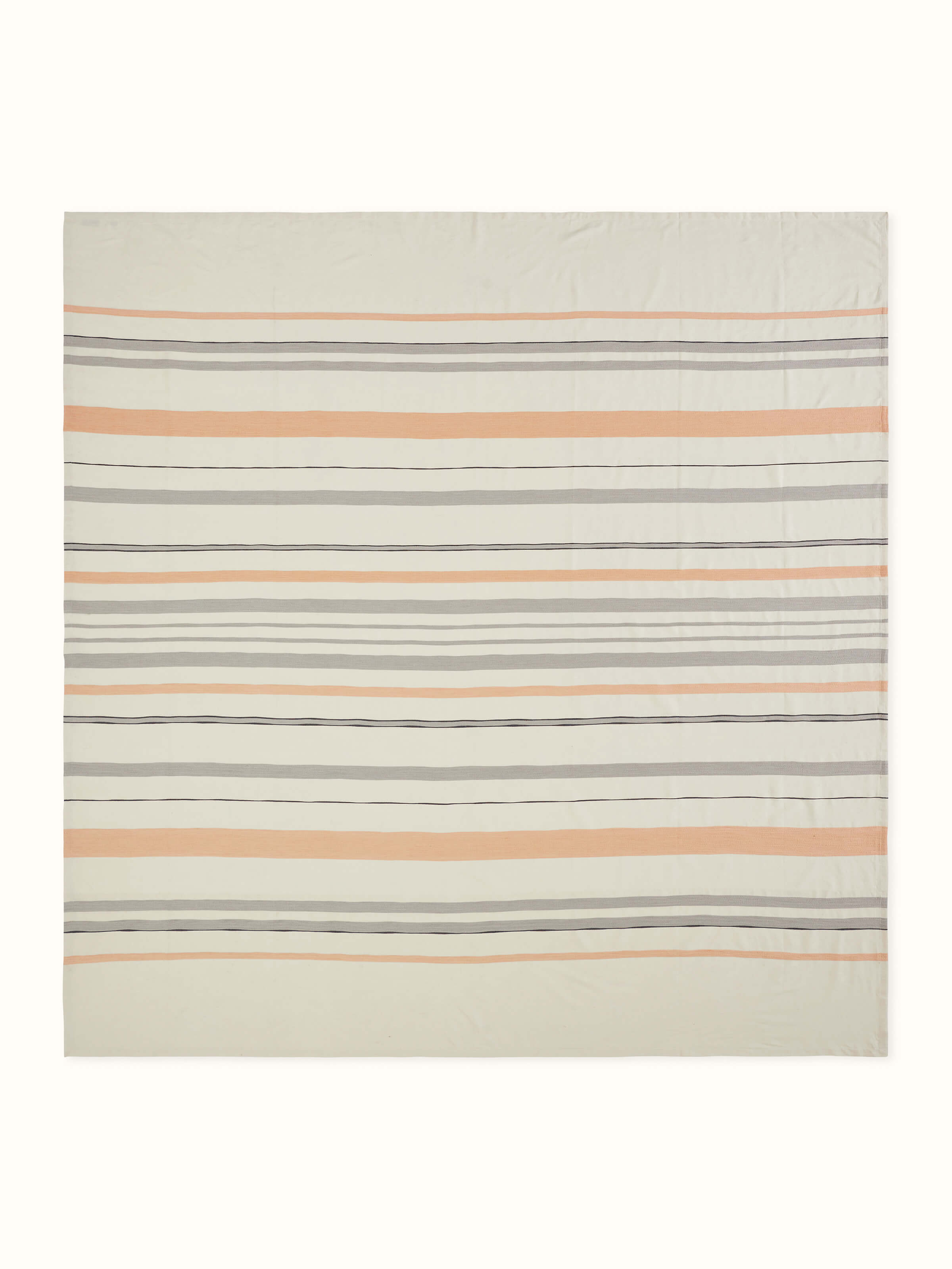 Angled display of Grey Handloom Bedspread, highlighting fine stripe texture and soft finish.