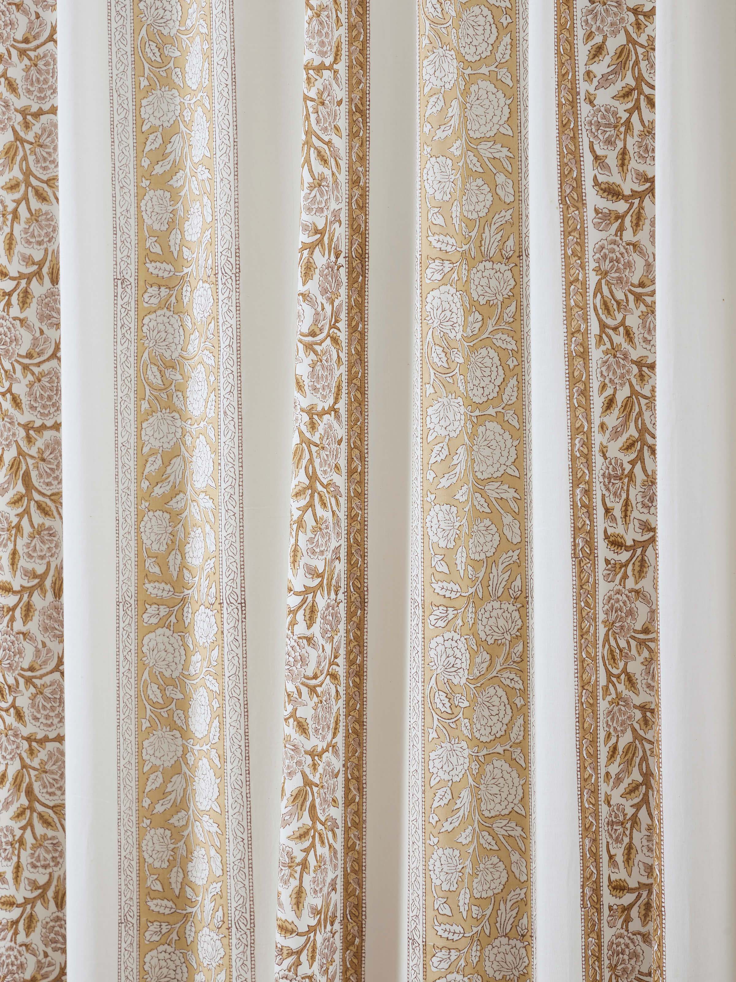 Fabric texture and print detail of brown floral stripe cotton curtain